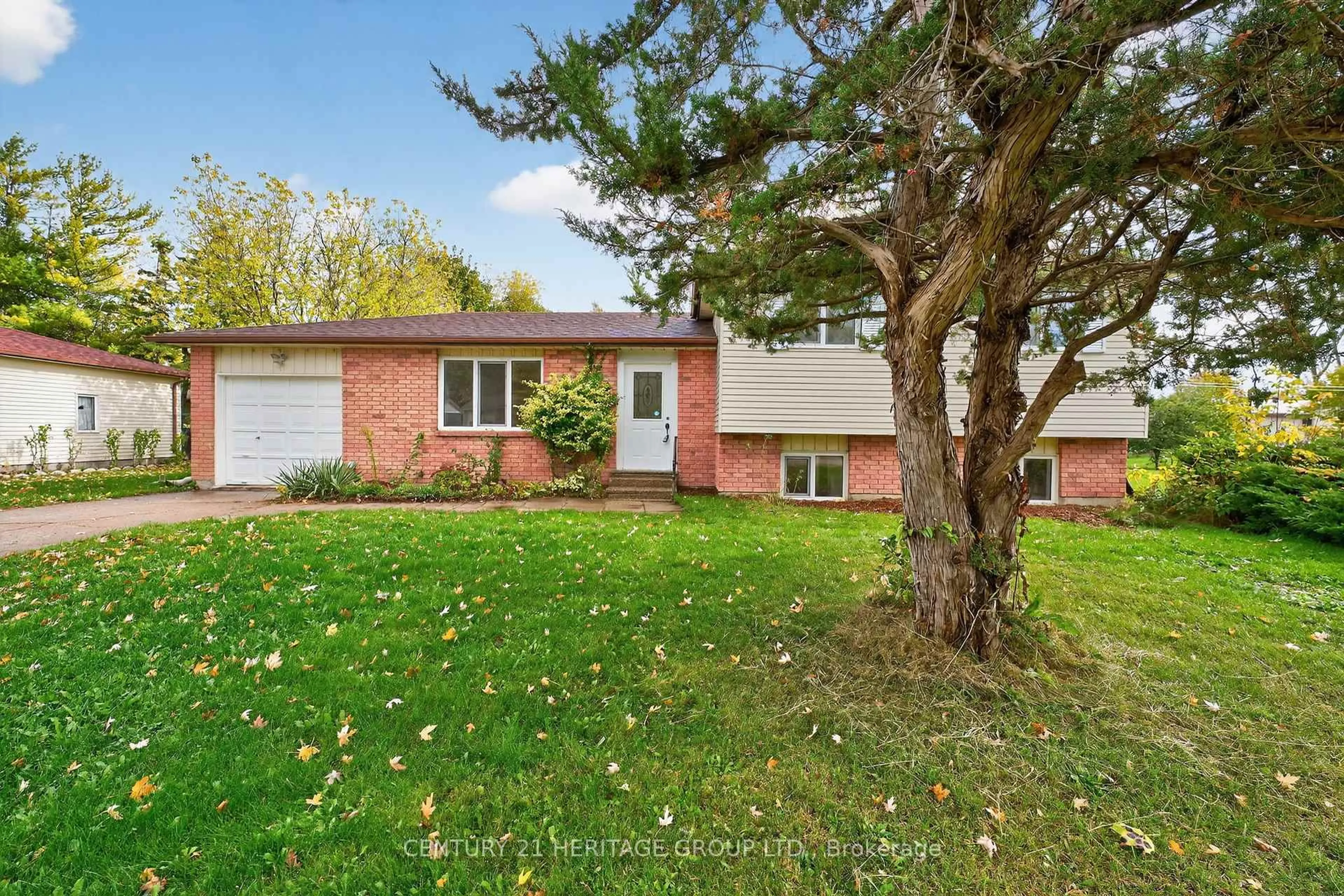 Home with brick exterior material, street for 1087 County Rd 42, Clearview Ontario L0M 1S0