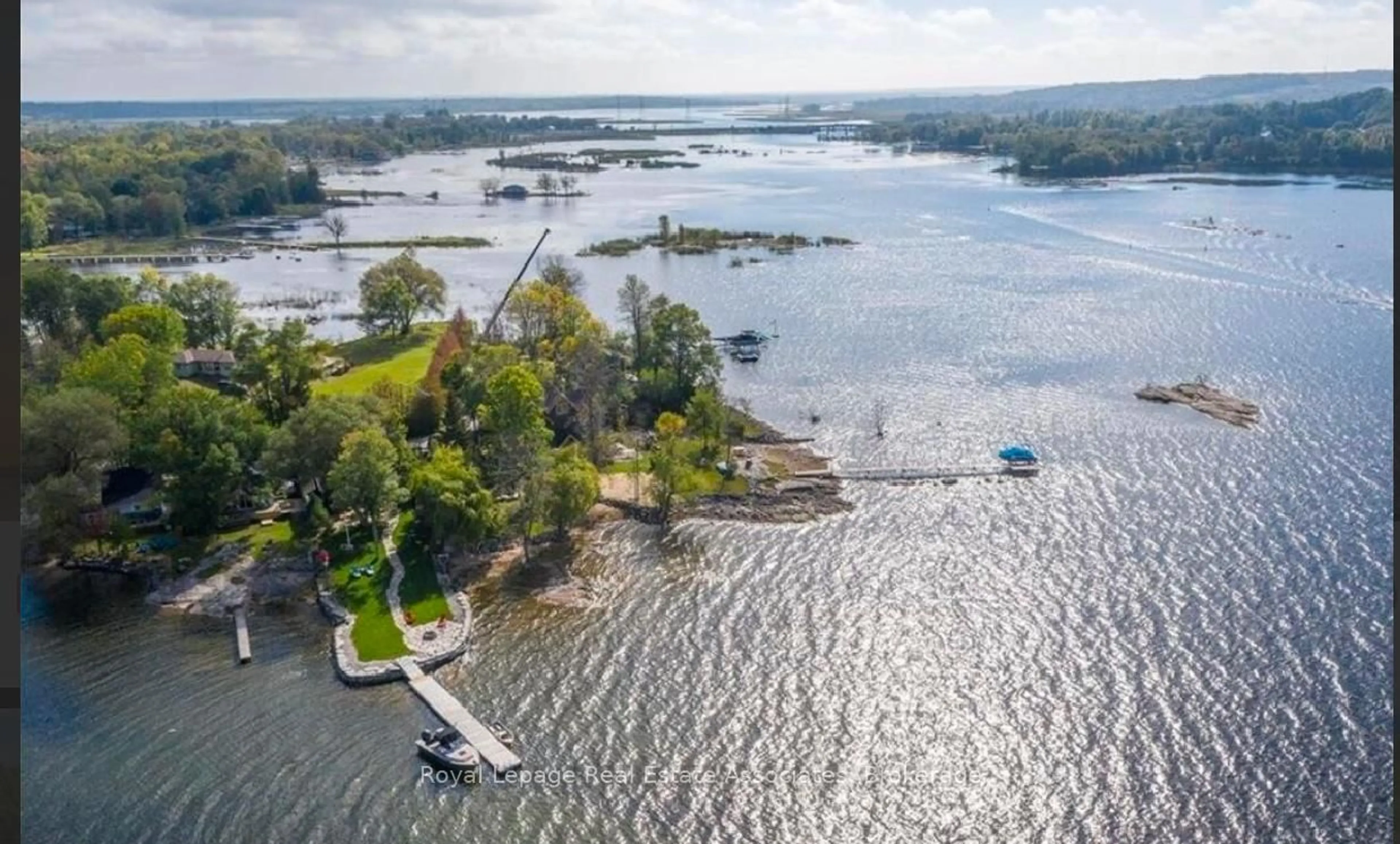 A pic from outside/outdoor area/front of a property/back of a property/a pic from drone, water/lake/river/ocean view for 14 Long Point Rd, Tay Ontario L0K 2C0