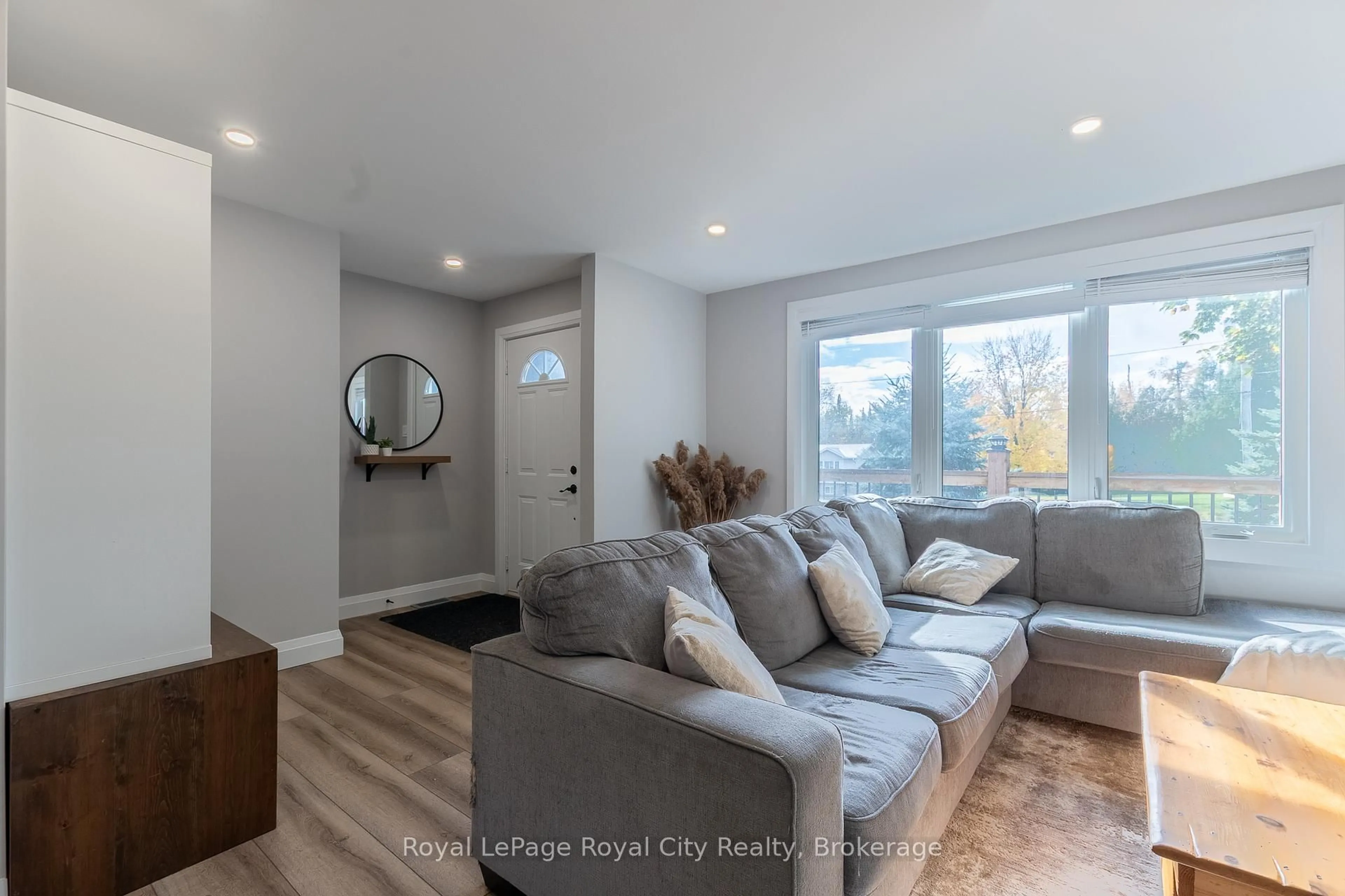 Living room with furniture, unknown for 3697 George Johnston Rd, Springwater Ontario L4M 4S4