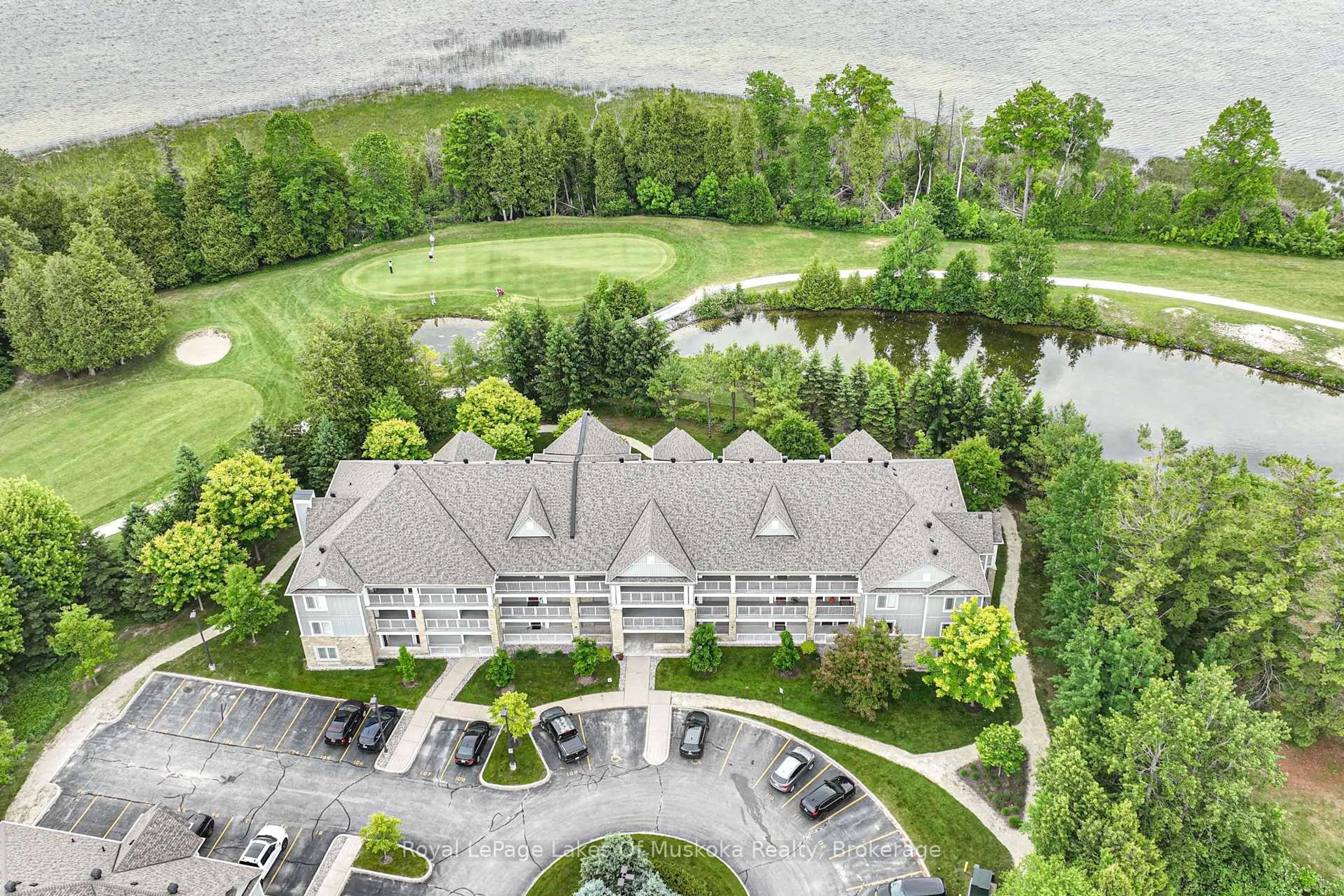 A pic from outside/outdoor area/front of a property/back of a property/a pic from drone, water/lake/river/ocean view for 60 Mulligan Lane #318, Wasaga Beach Ontario L9Z 0C5