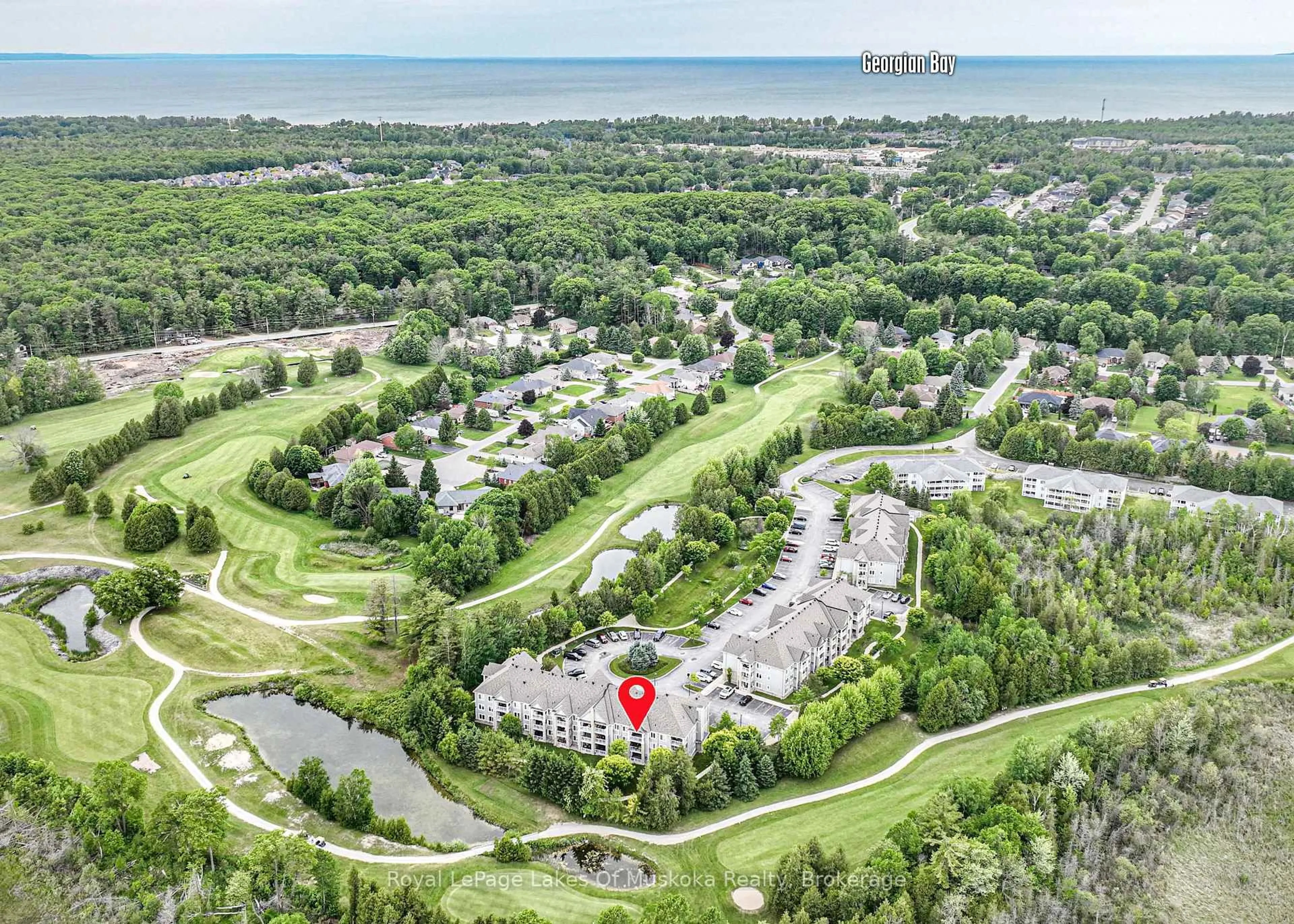 A pic from outside/outdoor area/front of a property/back of a property/a pic from drone, water/lake/river/ocean view for 60 Mulligan Lane #318, Wasaga Beach Ontario L9Z 0C5