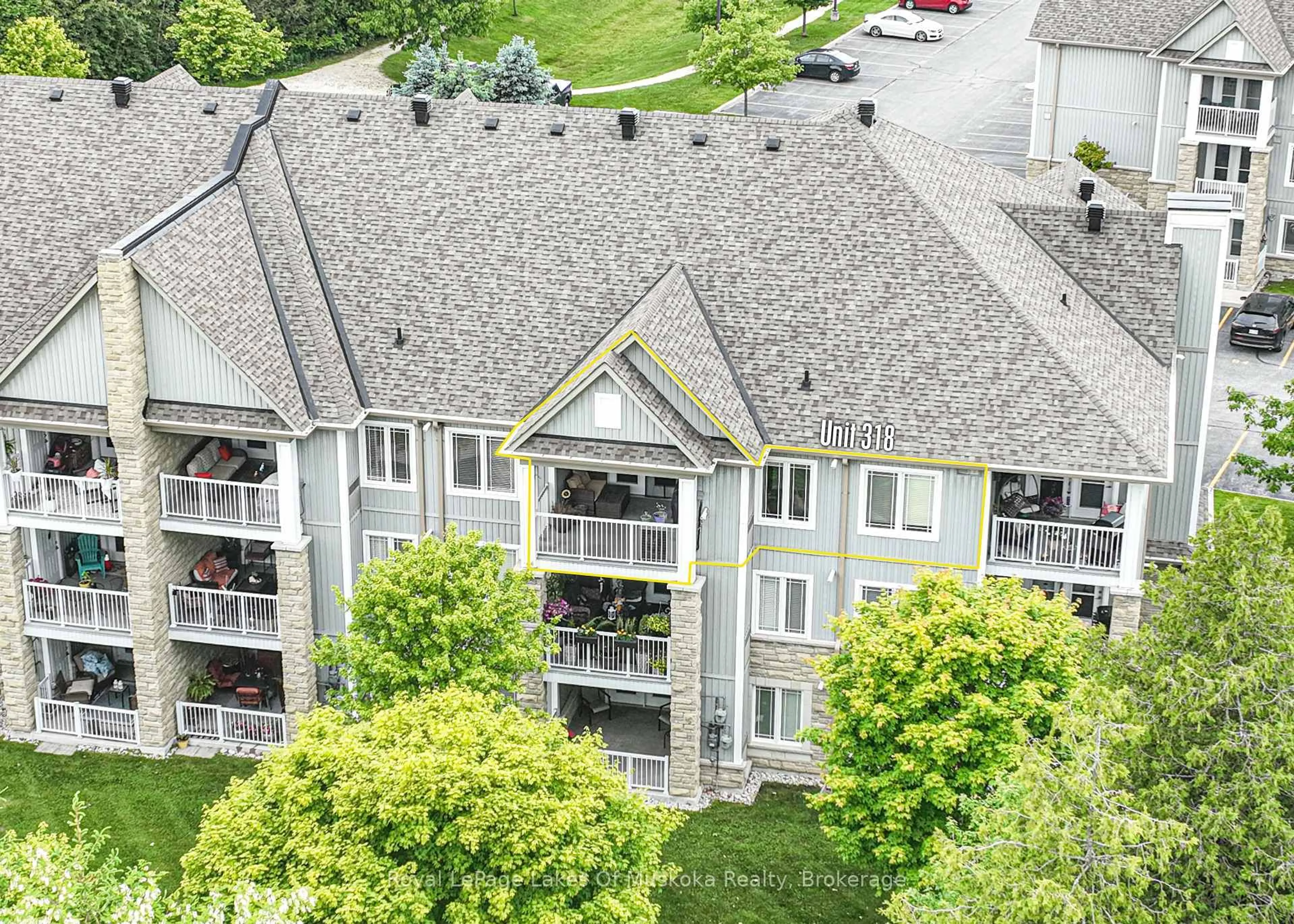 A pic from outside/outdoor area/front of a property/back of a property/a pic from drone, city buildings view from balcony for 60 Mulligan Lane #318, Wasaga Beach Ontario L9Z 0C5