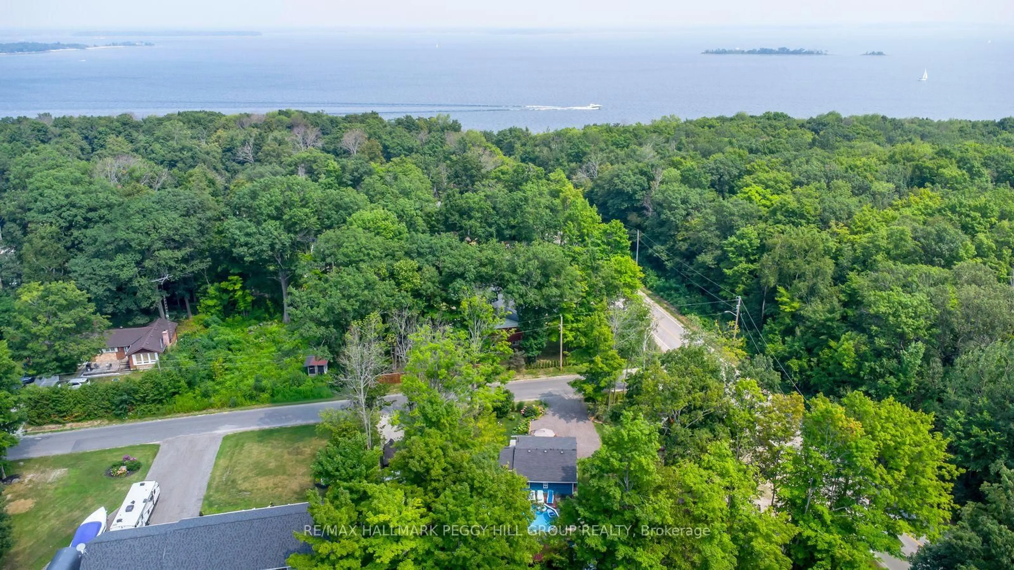 A pic from outside/outdoor area/front of a property/back of a property/a pic from drone, water/lake/river/ocean view for 28 Wozniak Rd, Penetanguishene Ontario L9M 1W5