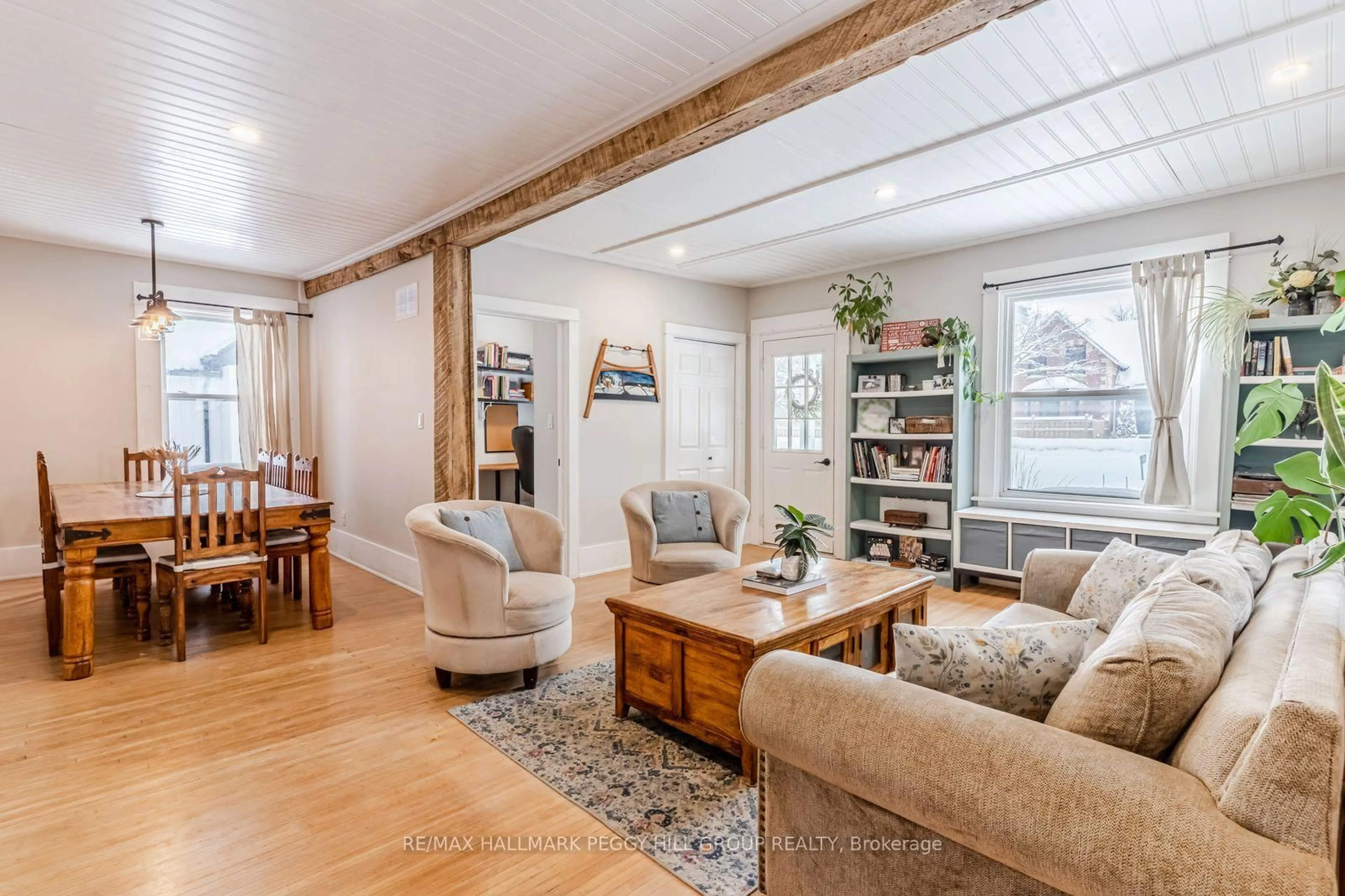 Living room with furniture, wood/laminate floor for 7196 26 Highway, Clearview Ontario L0M 1S0