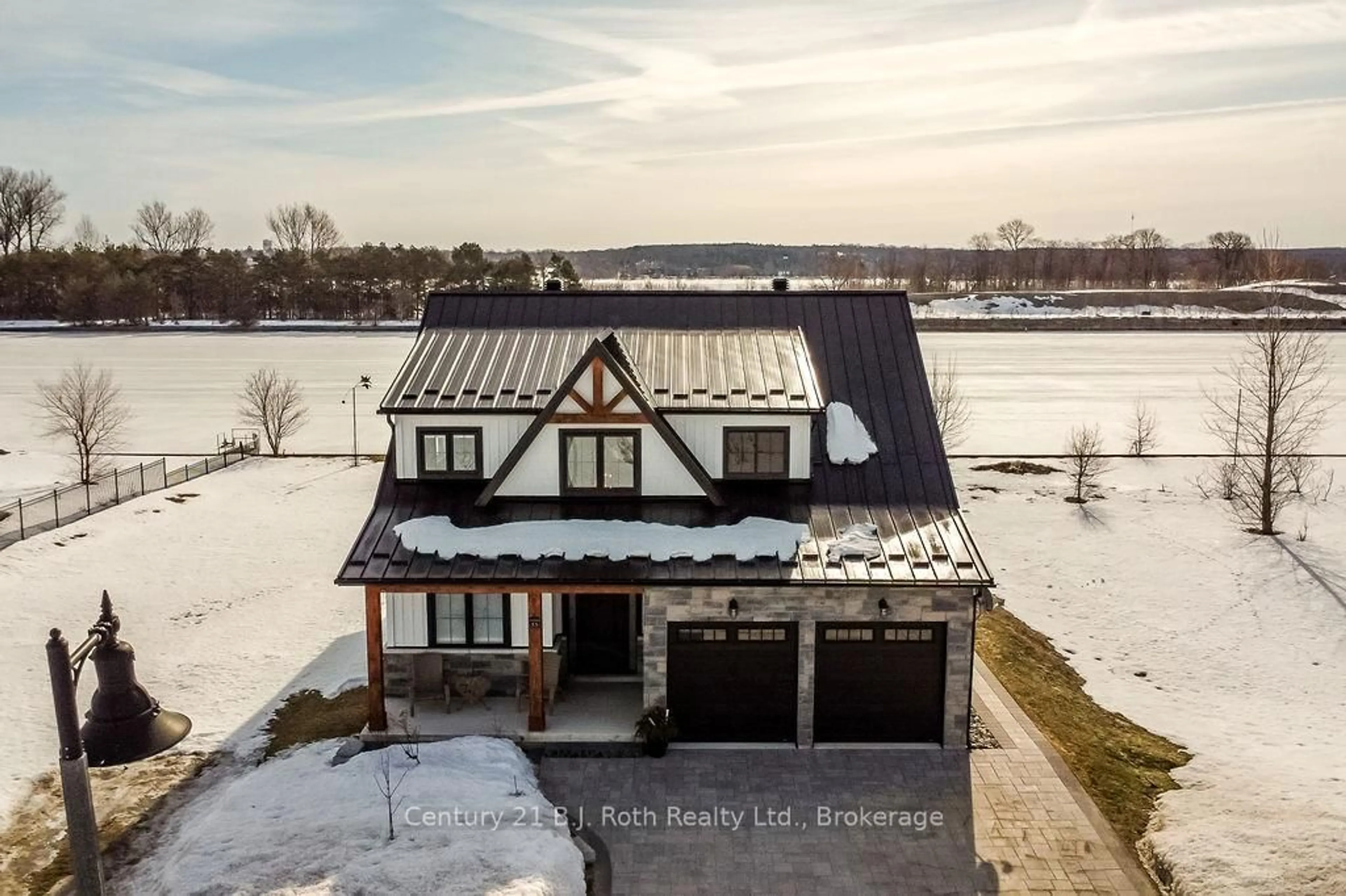 A pic from outside/outdoor area/front of a property/back of a property/a pic from drone, water/lake/river/ocean view for 53 Dock Lane #27, Tay Ontario L0K 1R0