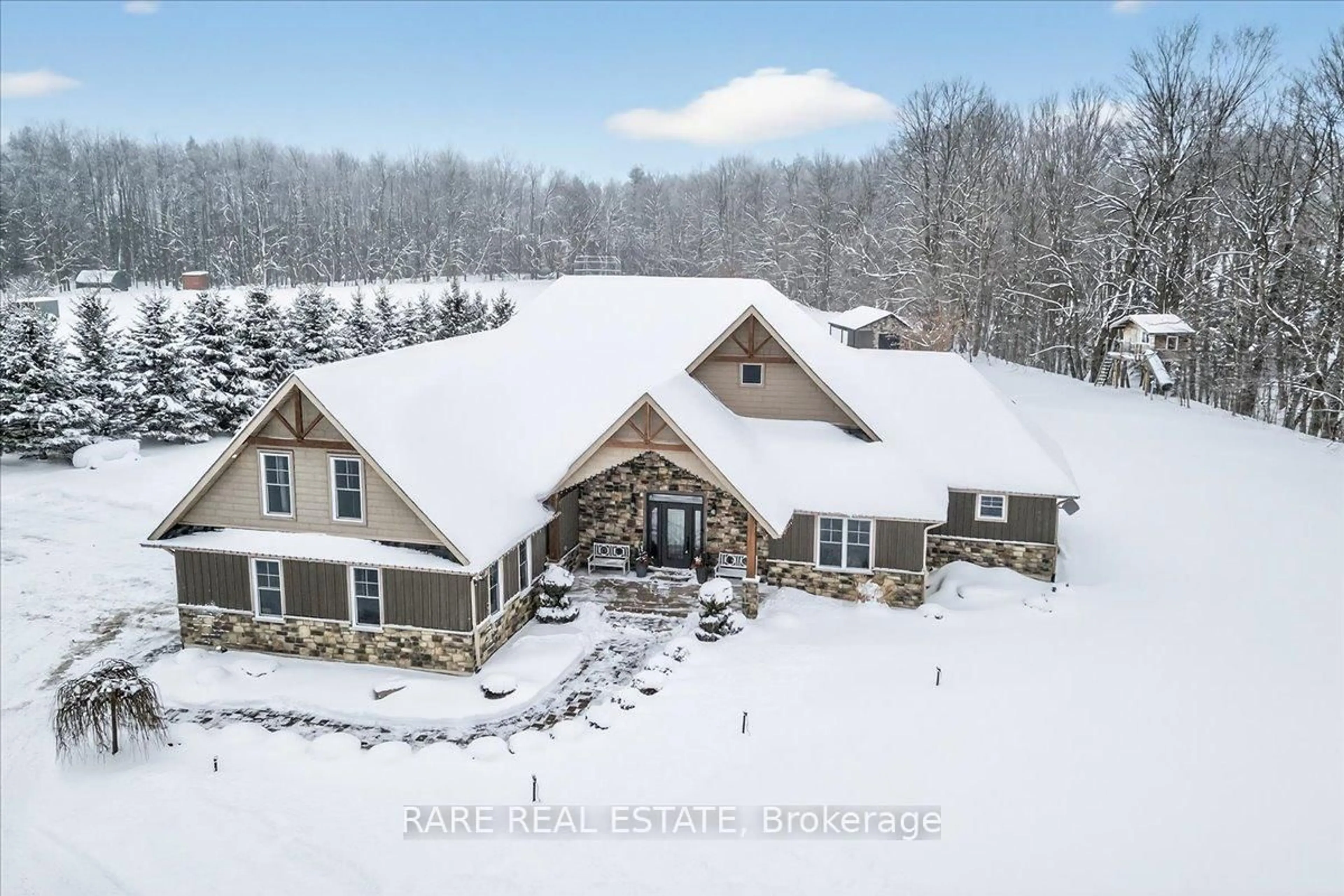 A pic from outside/outdoor area/front of a property/back of a property/a pic from drone, unknown for 2957 3/4 Sunnidale Sdrd, Clearview Ontario L0M 1N0