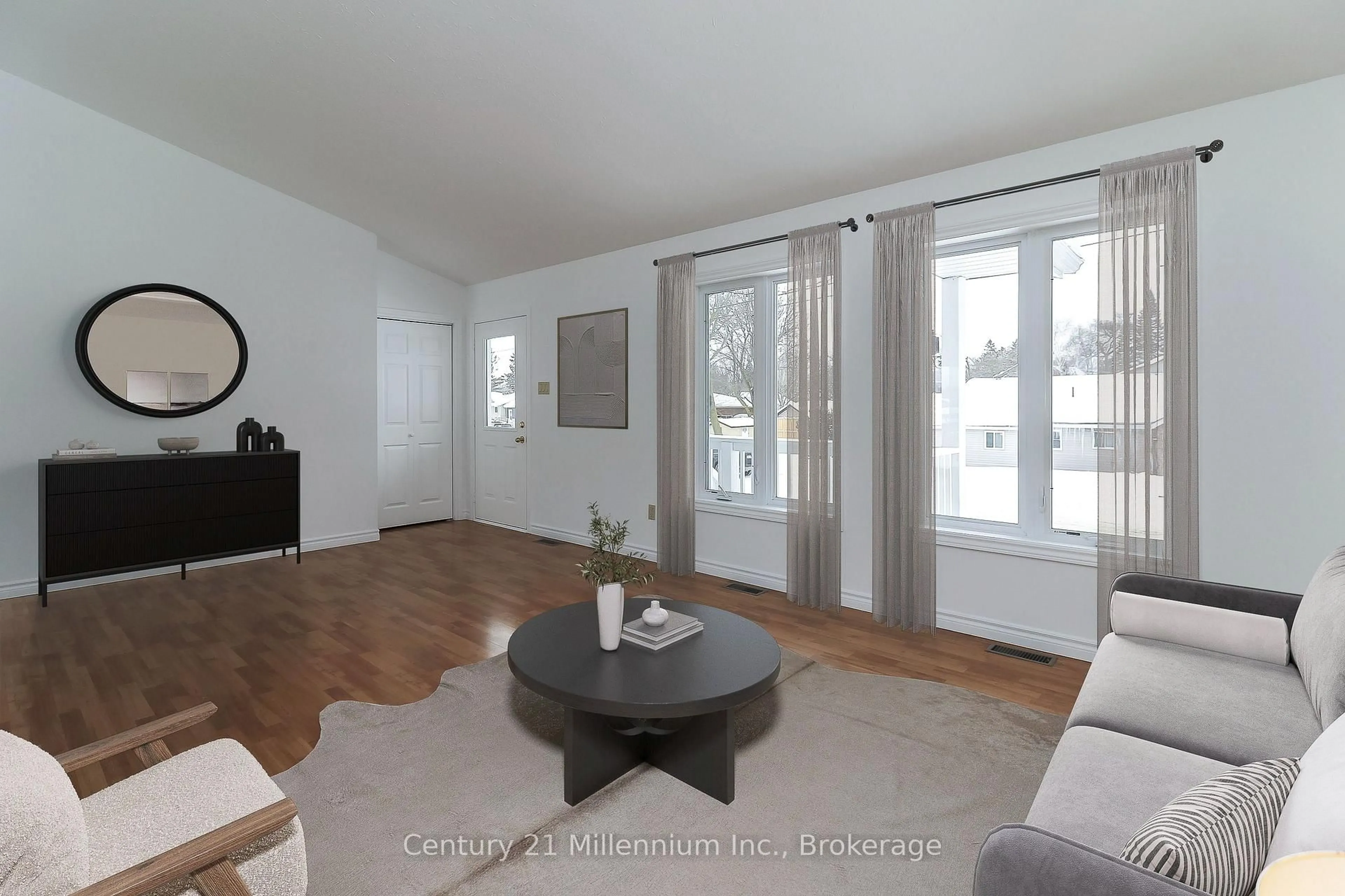 Living room with furniture, wood/laminate floor for 165 Paterson St, Collingwood Ontario L9Y 3N4