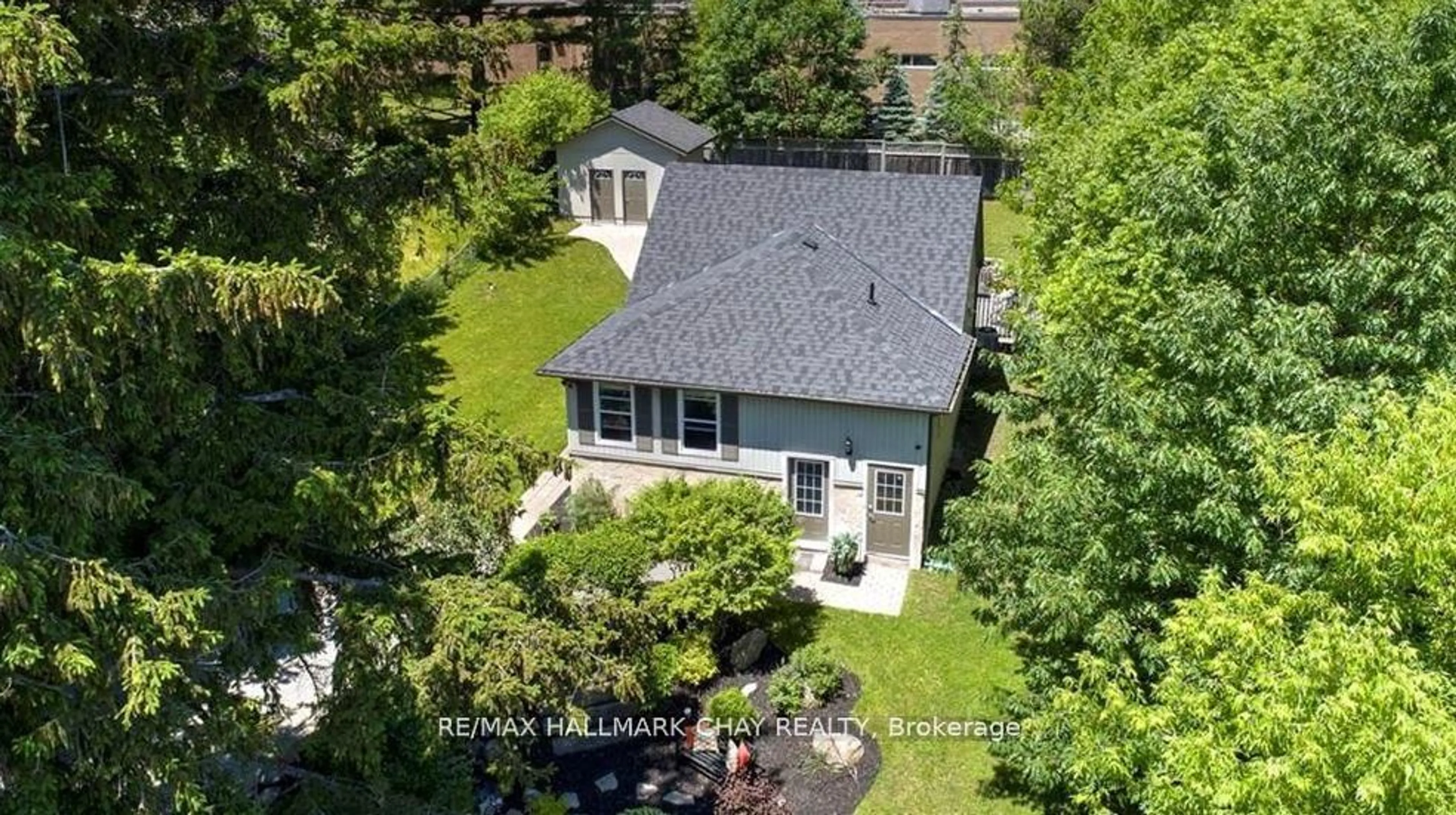 A pic from outside/outdoor area/front of a property/back of a property/a pic from drone, street for 32 Grove St #1, 2, 3, Barrie Ontario L4N 1M7