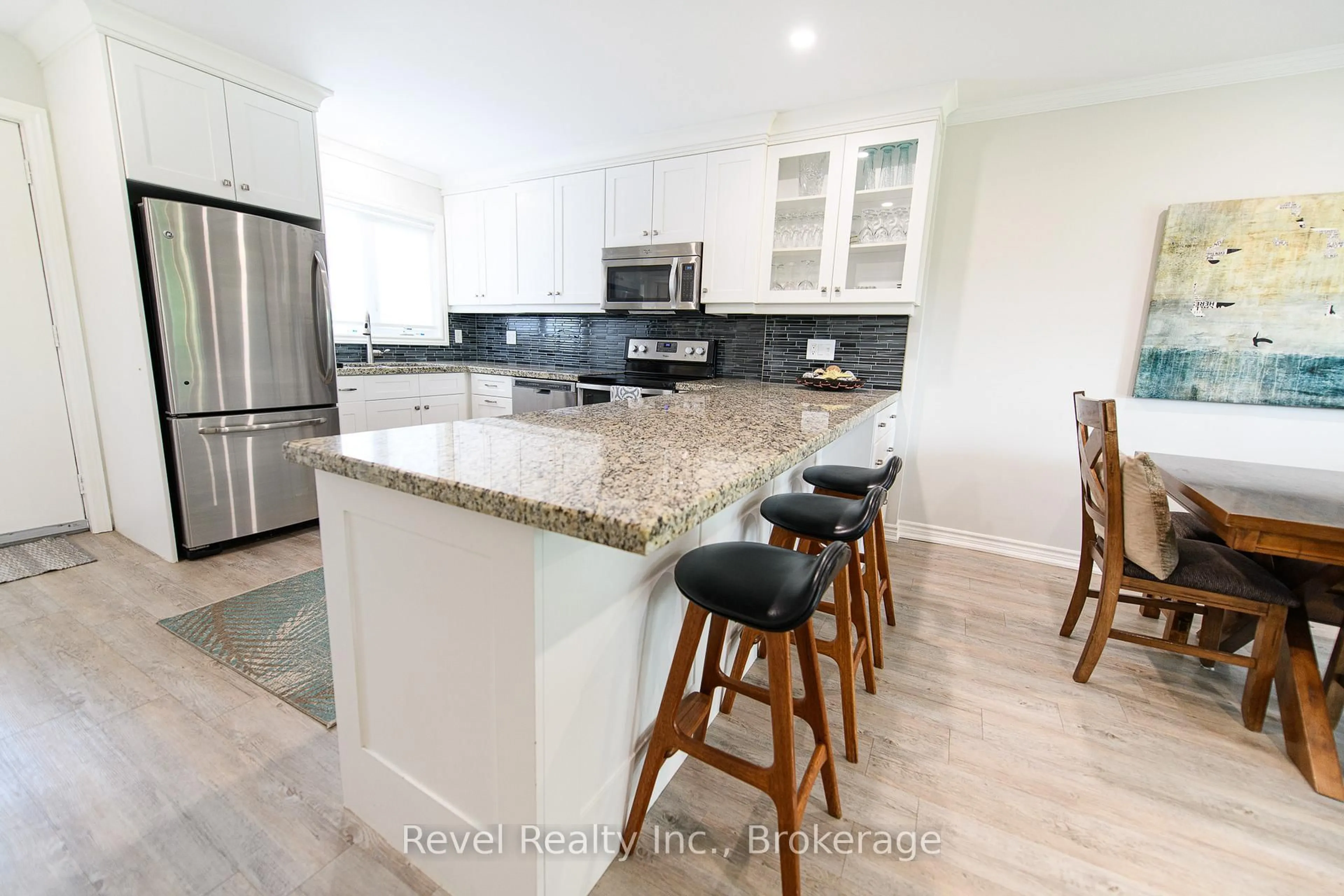 Open concept kitchen, ceramic/tile floor for 145 Fairway Cres #58, Collingwood Ontario L9Y 5B4