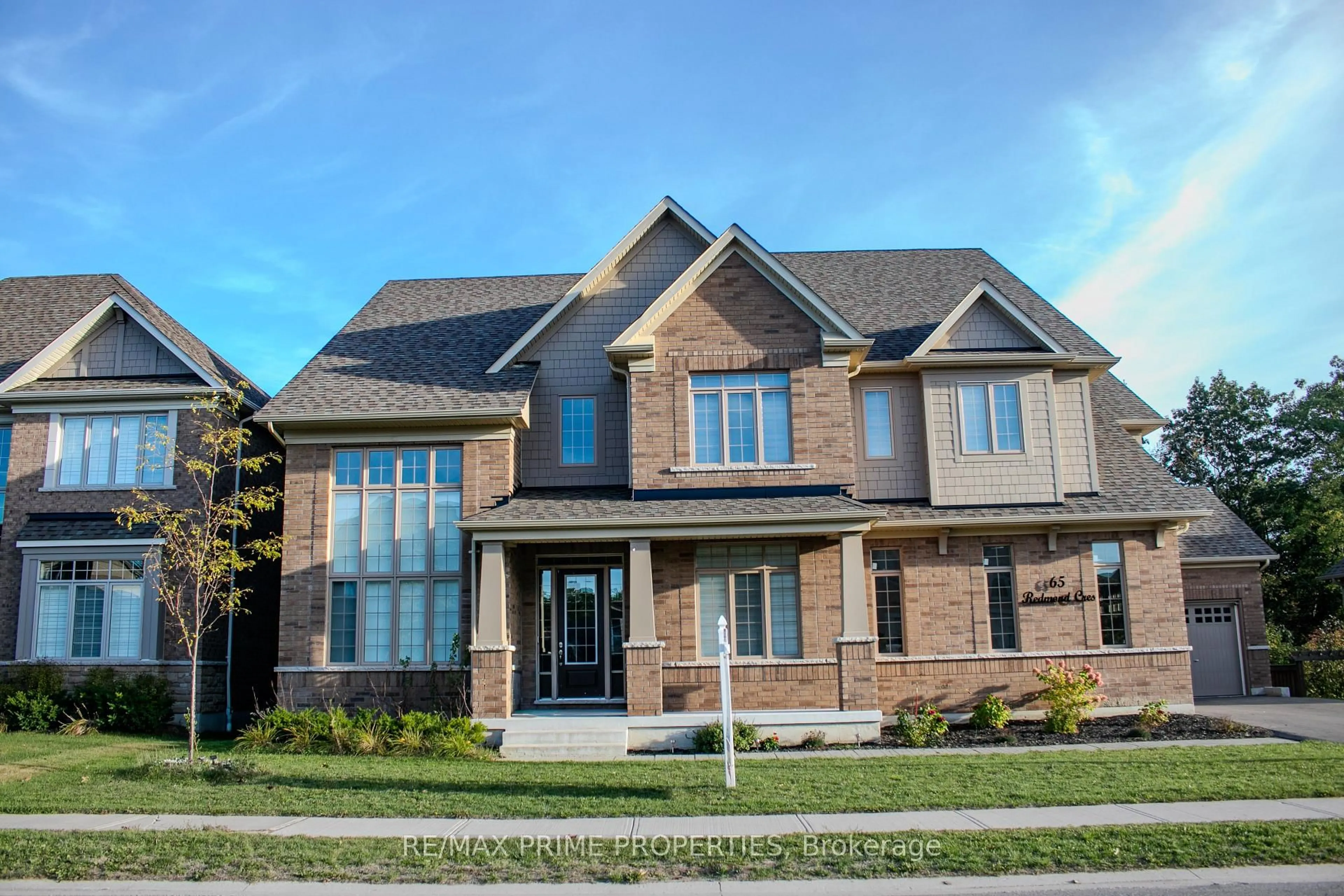 Home with brick exterior material, street for 65 Redmond Cres, Springwater Ontario L9X 1Z8