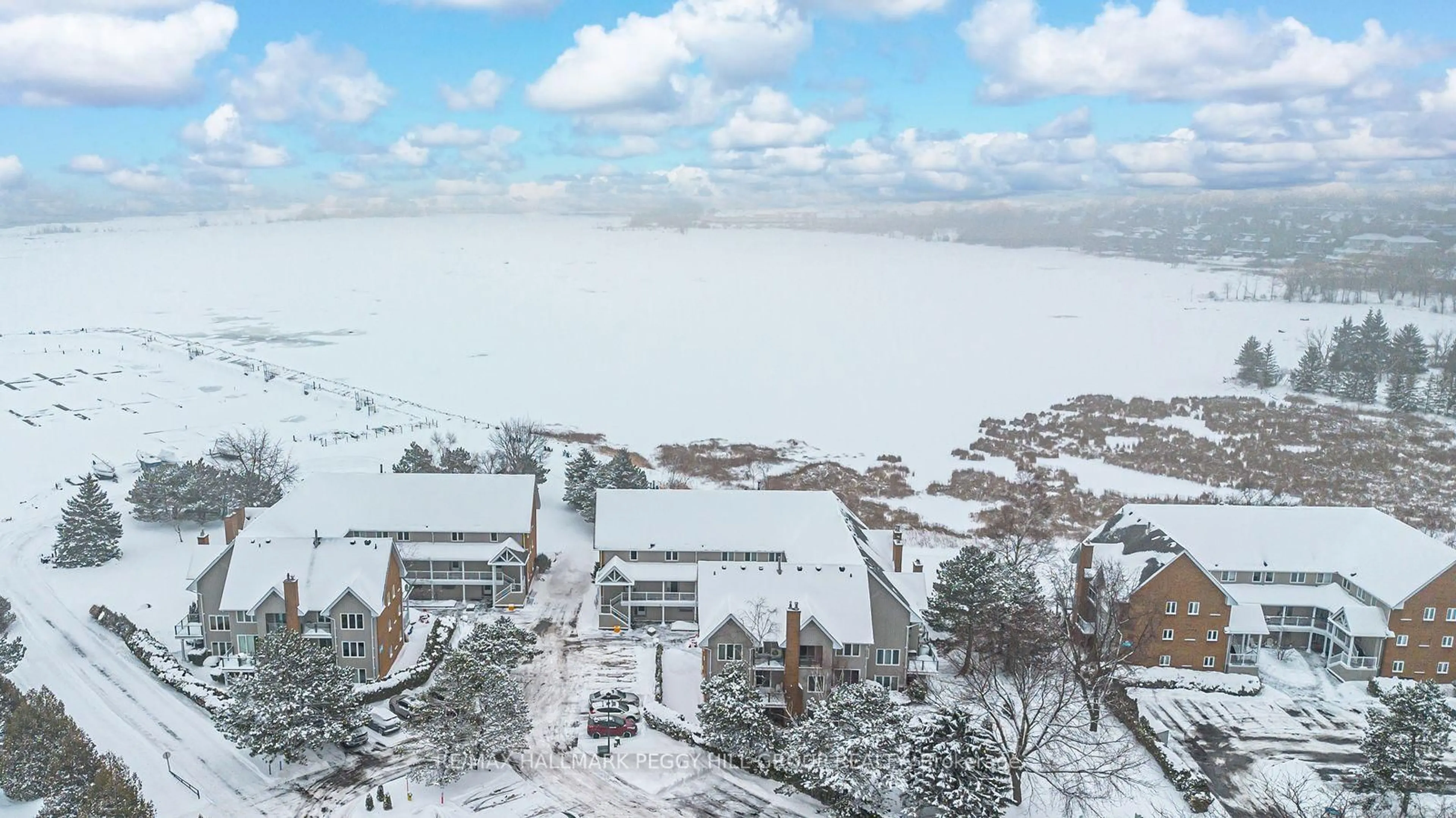 A pic from outside/outdoor area/front of a property/back of a property/a pic from drone, water/lake/river/ocean view for 8 Ramblings Way #121, Collingwood Ontario L9Y 5S3