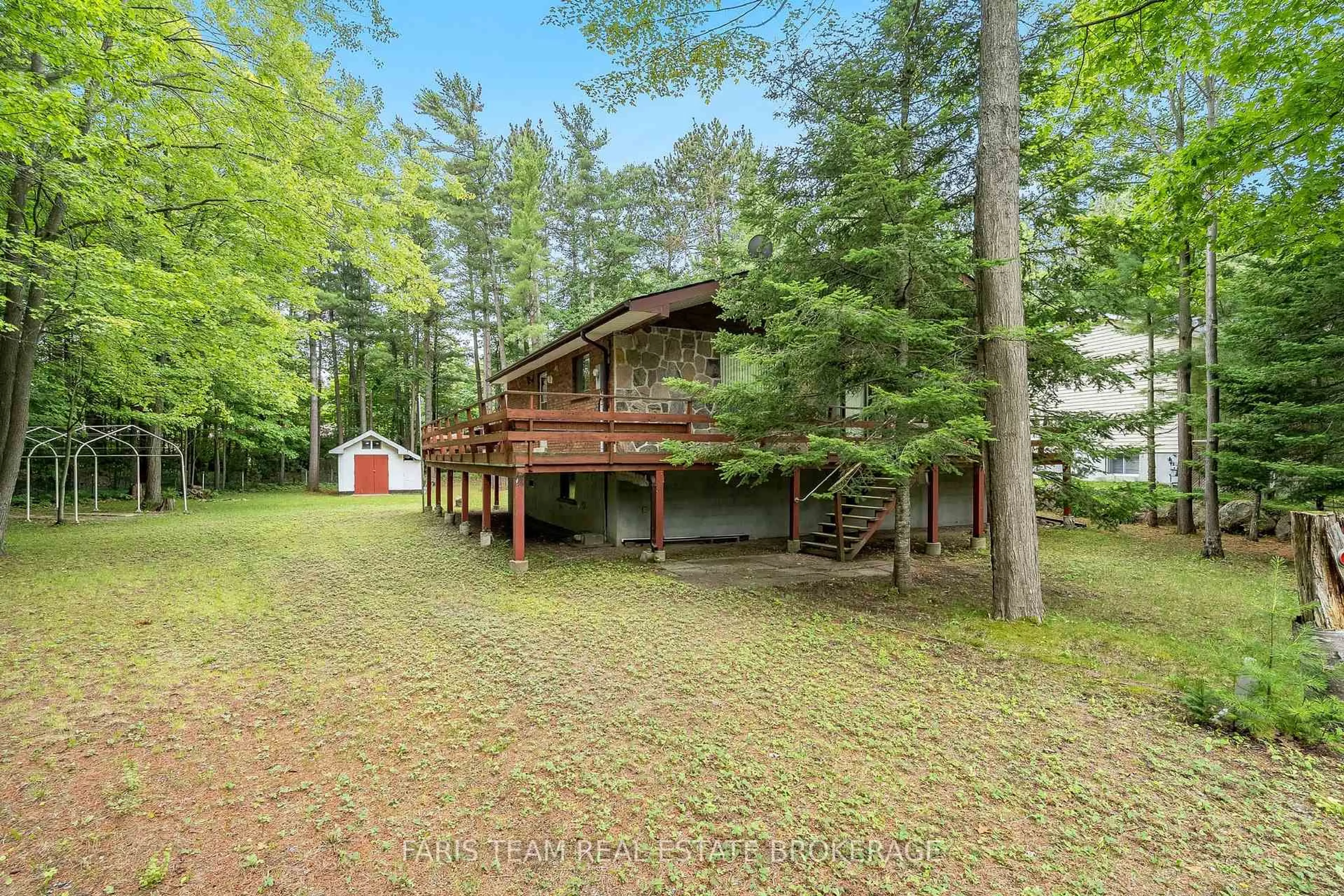 A pic from outside/outdoor area/front of a property/back of a property/a pic from drone, forest/trees view for 39 Rosemary Rd, Tiny Ontario L0L 2T0