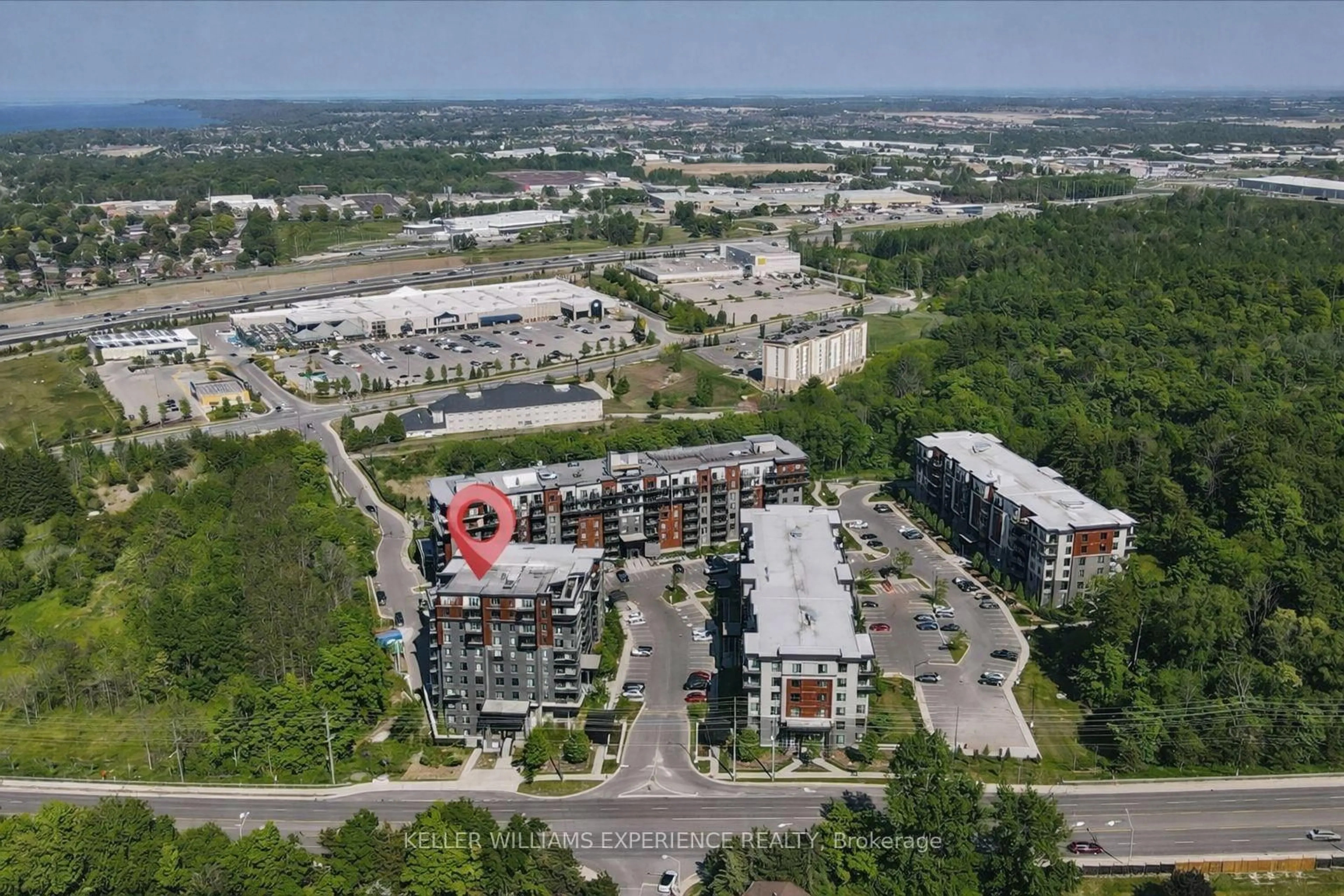 A pic from outside/outdoor area/front of a property/back of a property/a pic from drone, unknown for 300 Essa Rd #404, Barrie Ontario L4N 9Y4