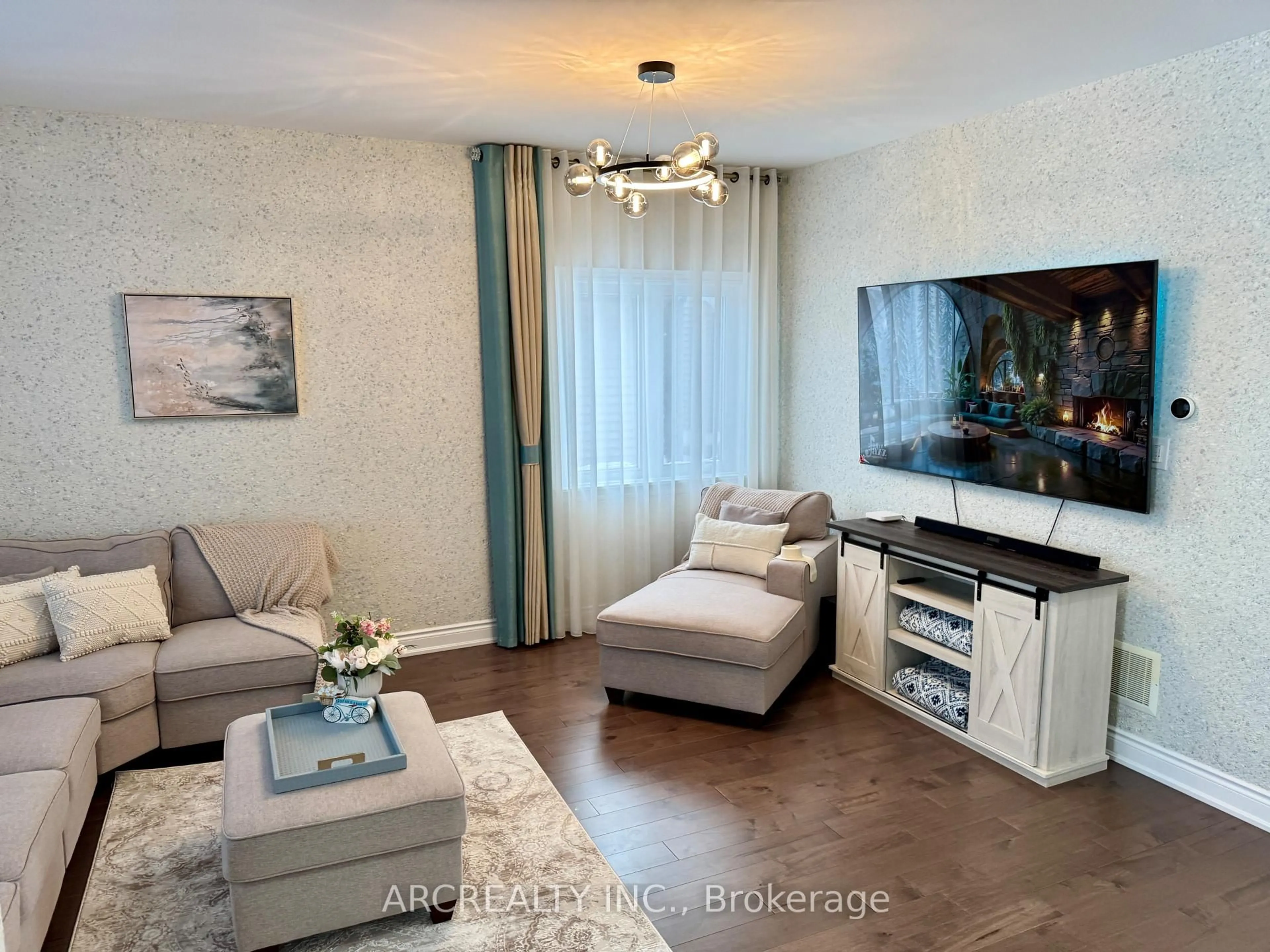 Living room with furniture, wood/laminate floor for 51 Landscape Dr, Oro-Medonte Ontario L0L 2L0