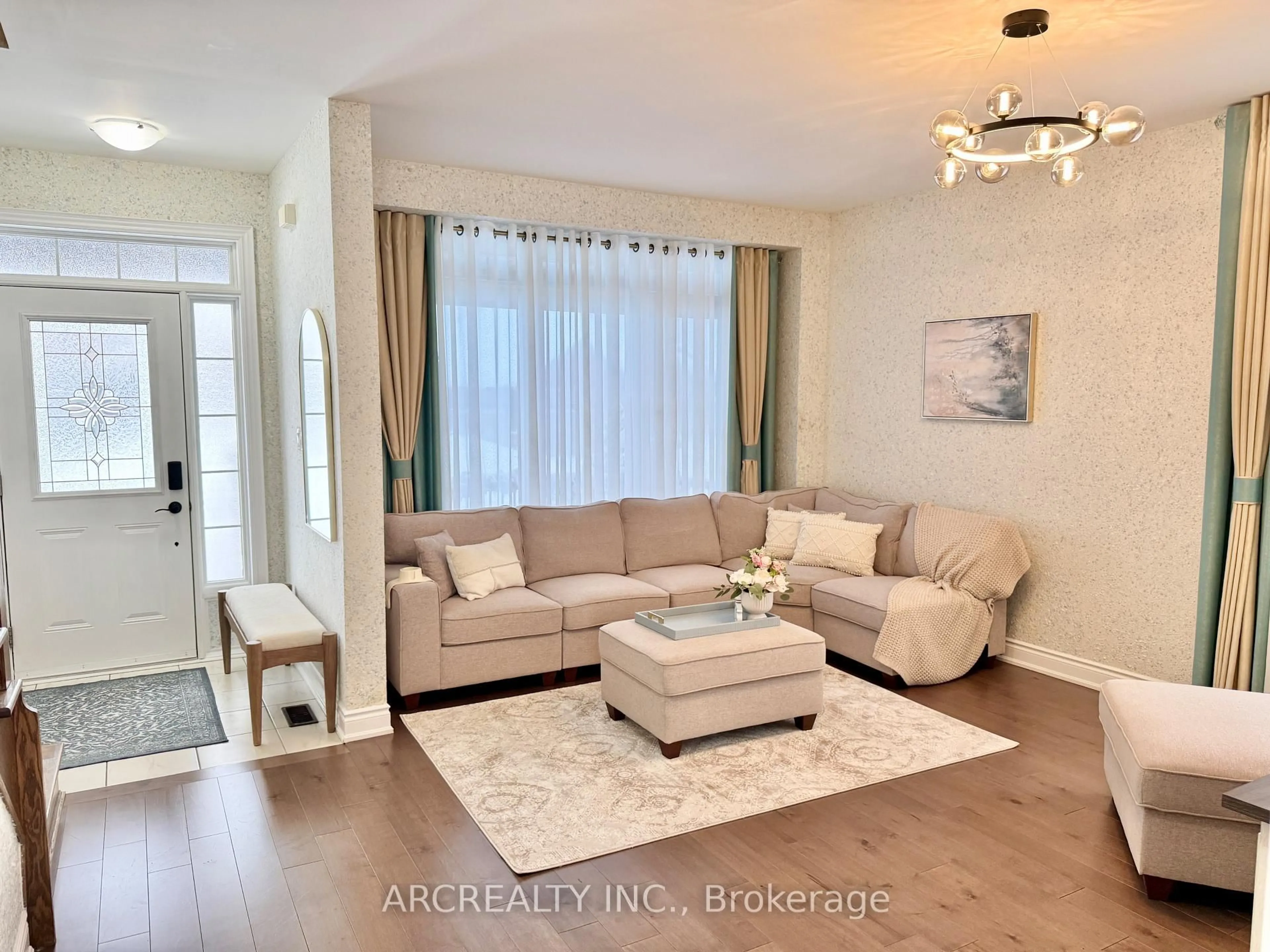 Living room with furniture, wood/laminate floor for 51 Landscape Dr, Oro-Medonte Ontario L0L 2L0