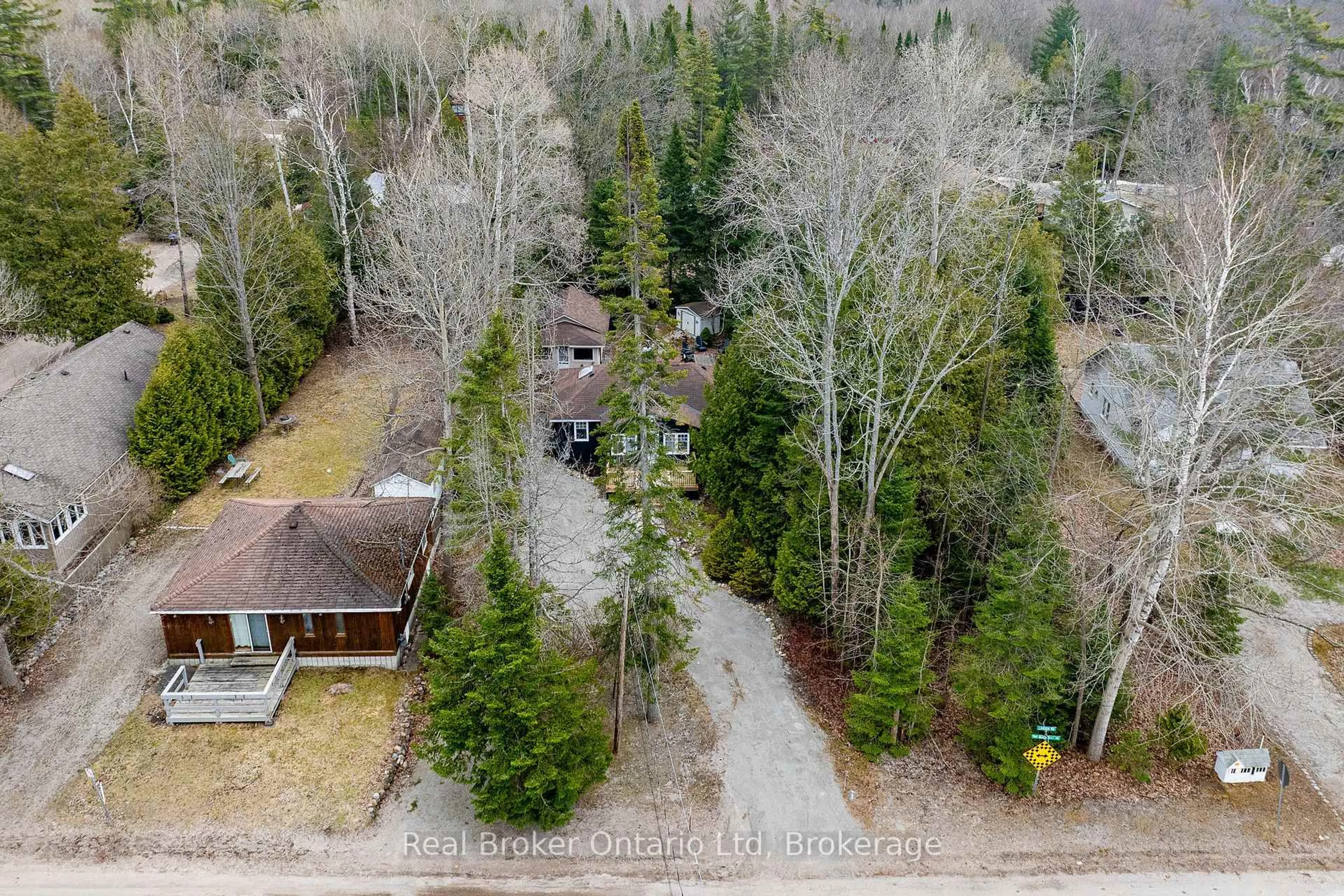 A pic from outside/outdoor area/front of a property/back of a property/a pic from drone, forest/trees view for 1071 LAWSON Rd, Tiny Ontario L0L 1P0