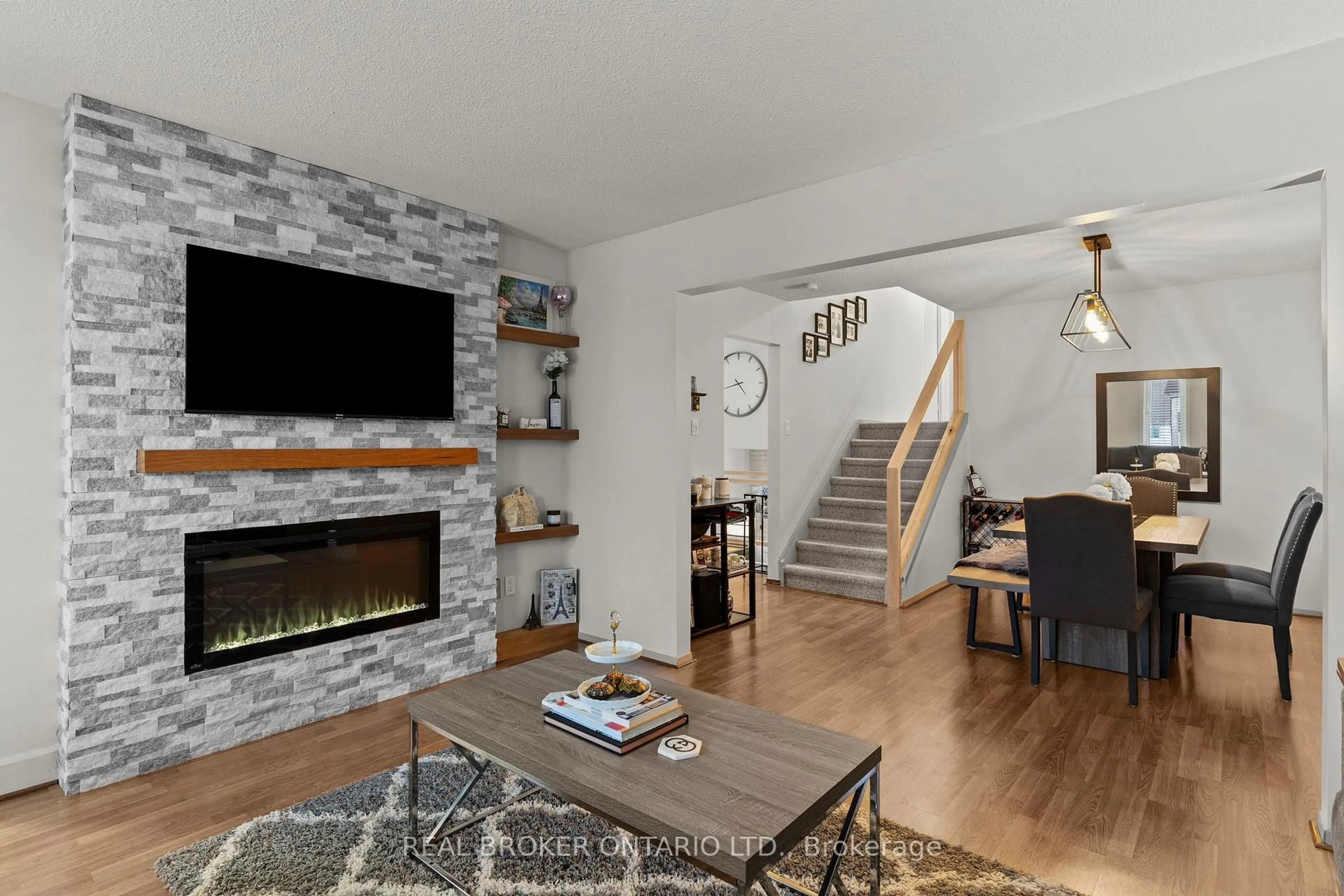 Living room with furniture, wood/laminate floor for 34 Lankin Blvd, Orillia Ontario L3V 6T2