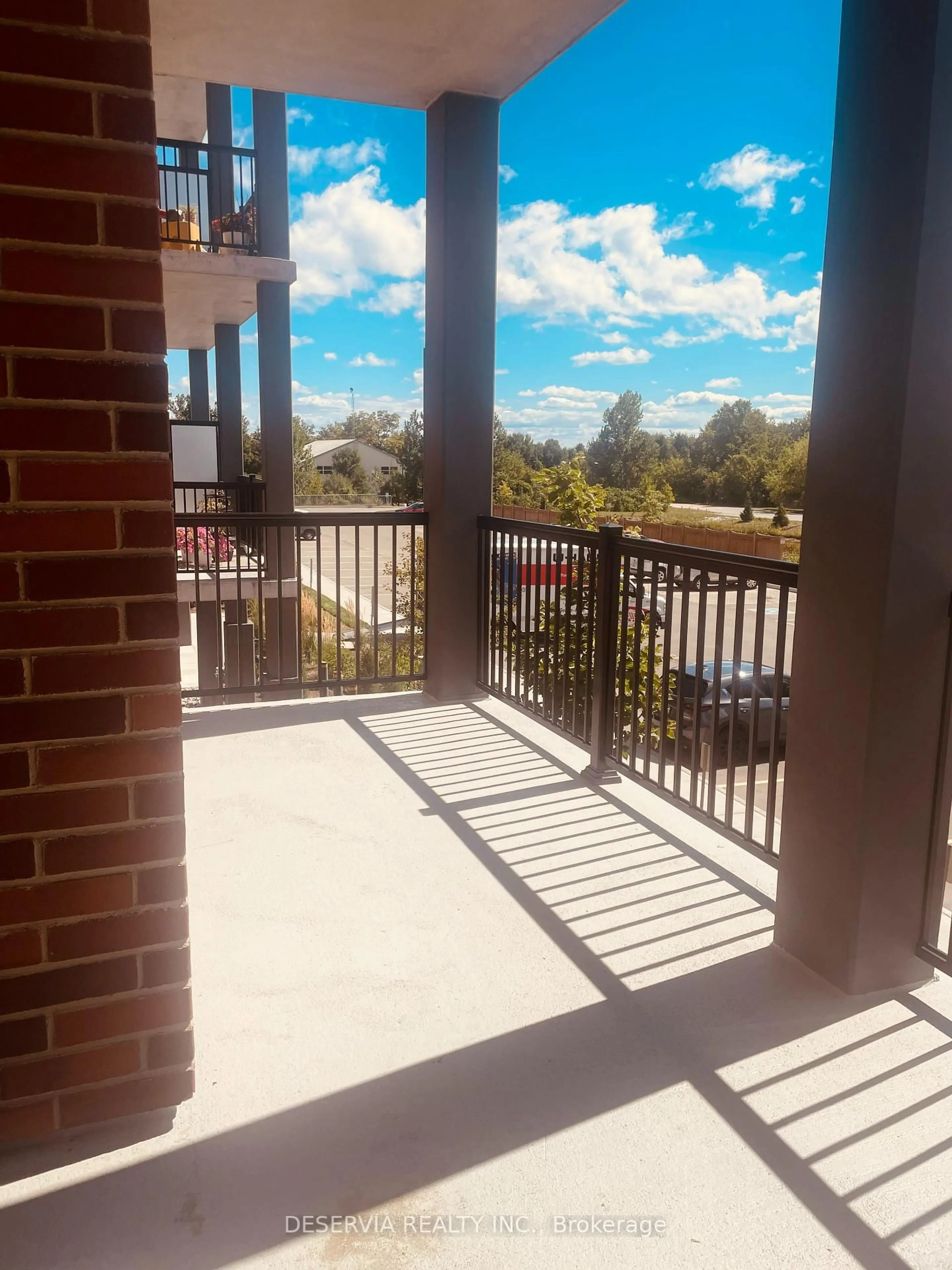 Balcony in the apartment, city buildings view from balcony for 121 Mary St #Unit 205, Clearview Ontario L0M 1G0