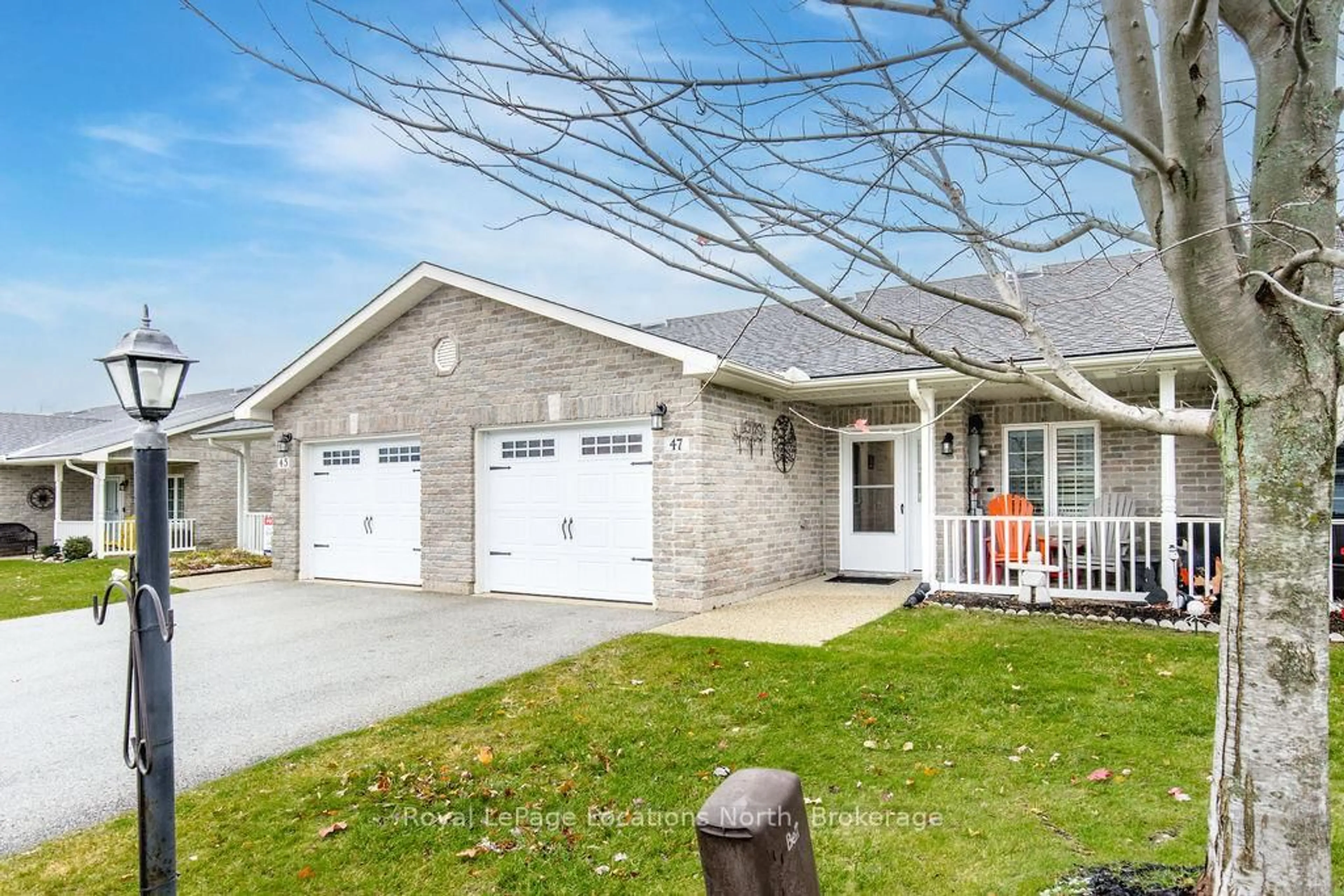 Home with brick exterior material, street for 47 Clover Cres, Wasaga Beach Ontario L9Z 0G4