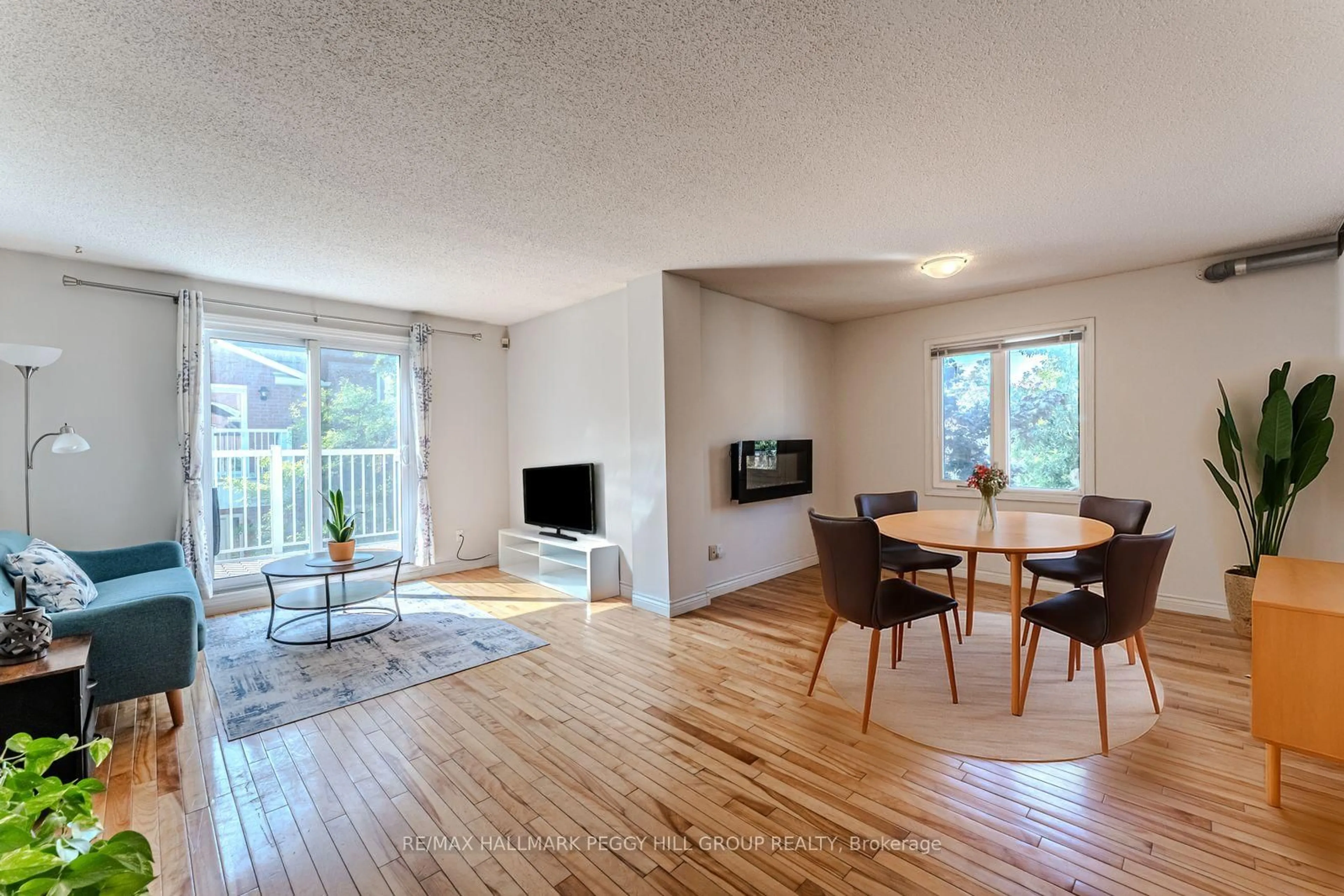 Living room with furniture, unknown for 508 Essa Rd #52, Barrie Ontario L4N 7L5