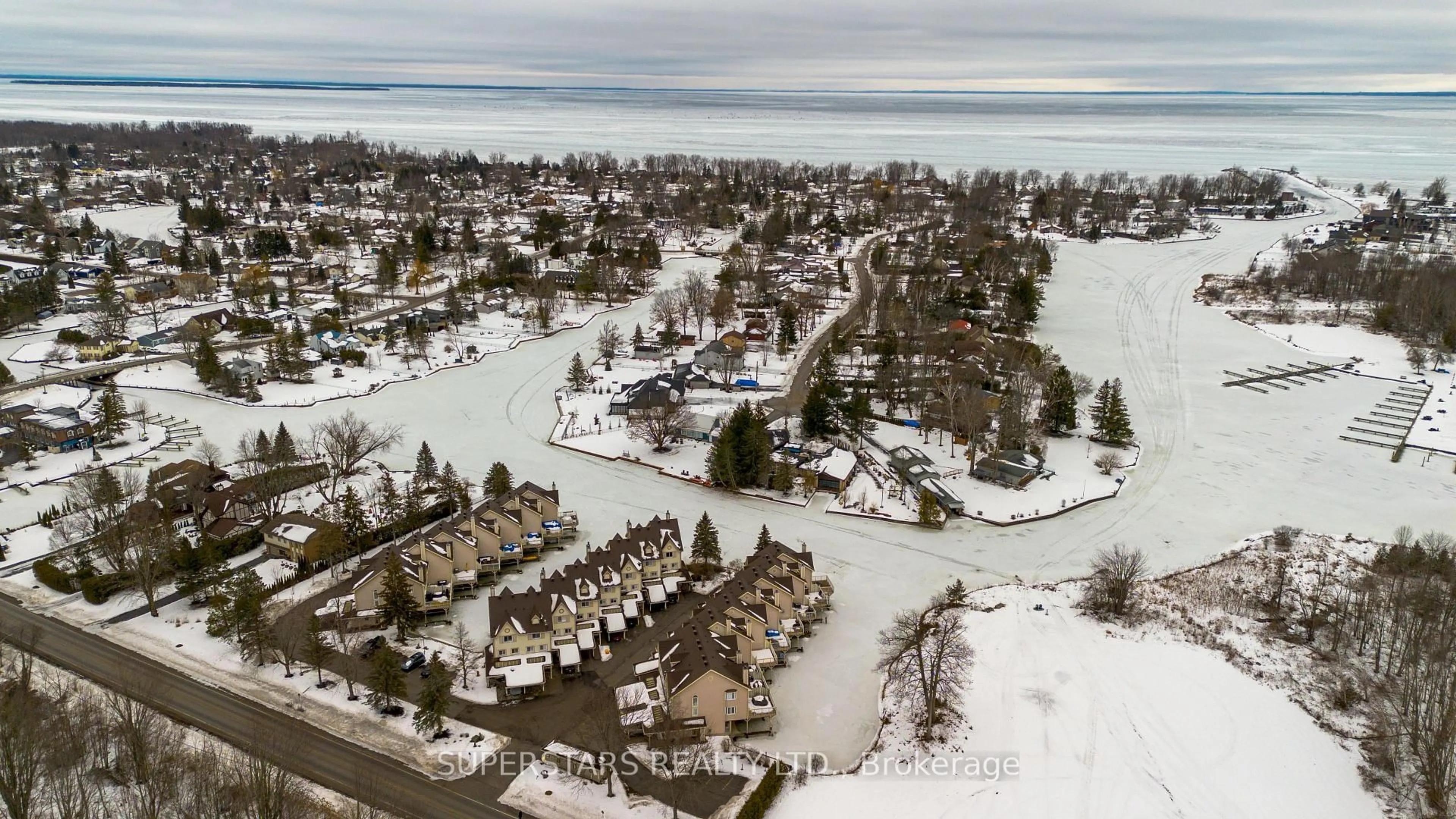 A pic from outside/outdoor area/front of a property/back of a property/a pic from drone, water/lake/river/ocean view for 100 Laguna Pkwy #23, Ramara Ontario L0K 1B0