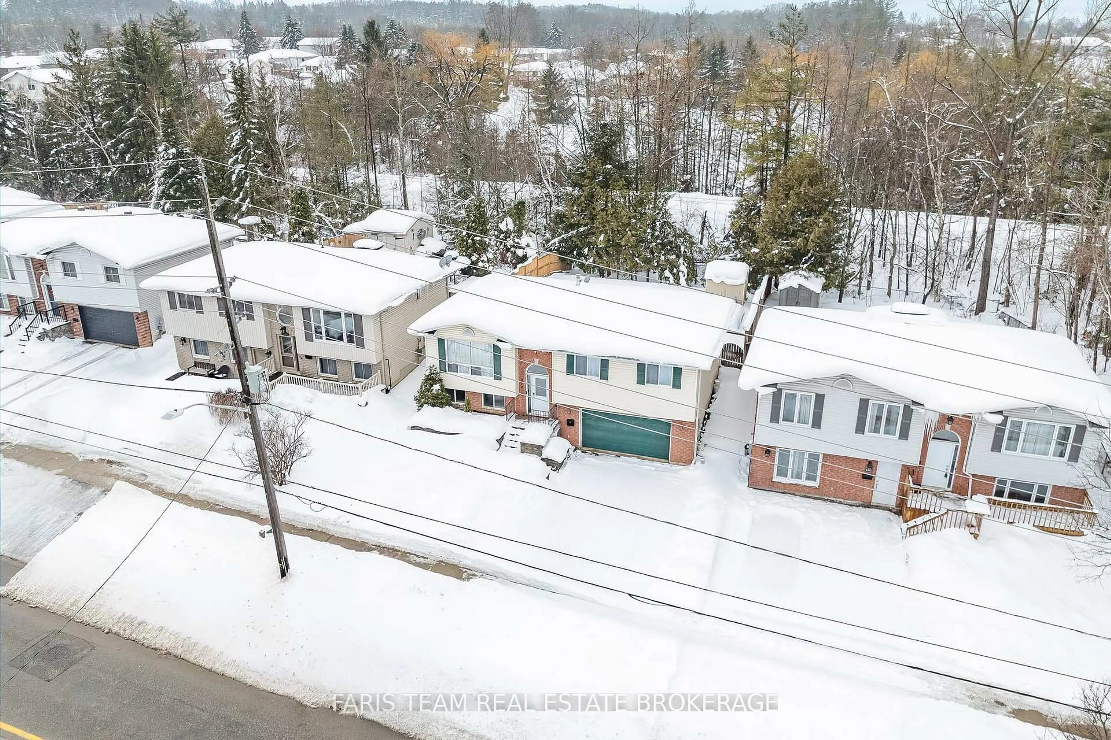 A pic from outside/outdoor area/front of a property/back of a property/a pic from drone, street for 214 Huronia Rd, Barrie Ontario L4N 8A7