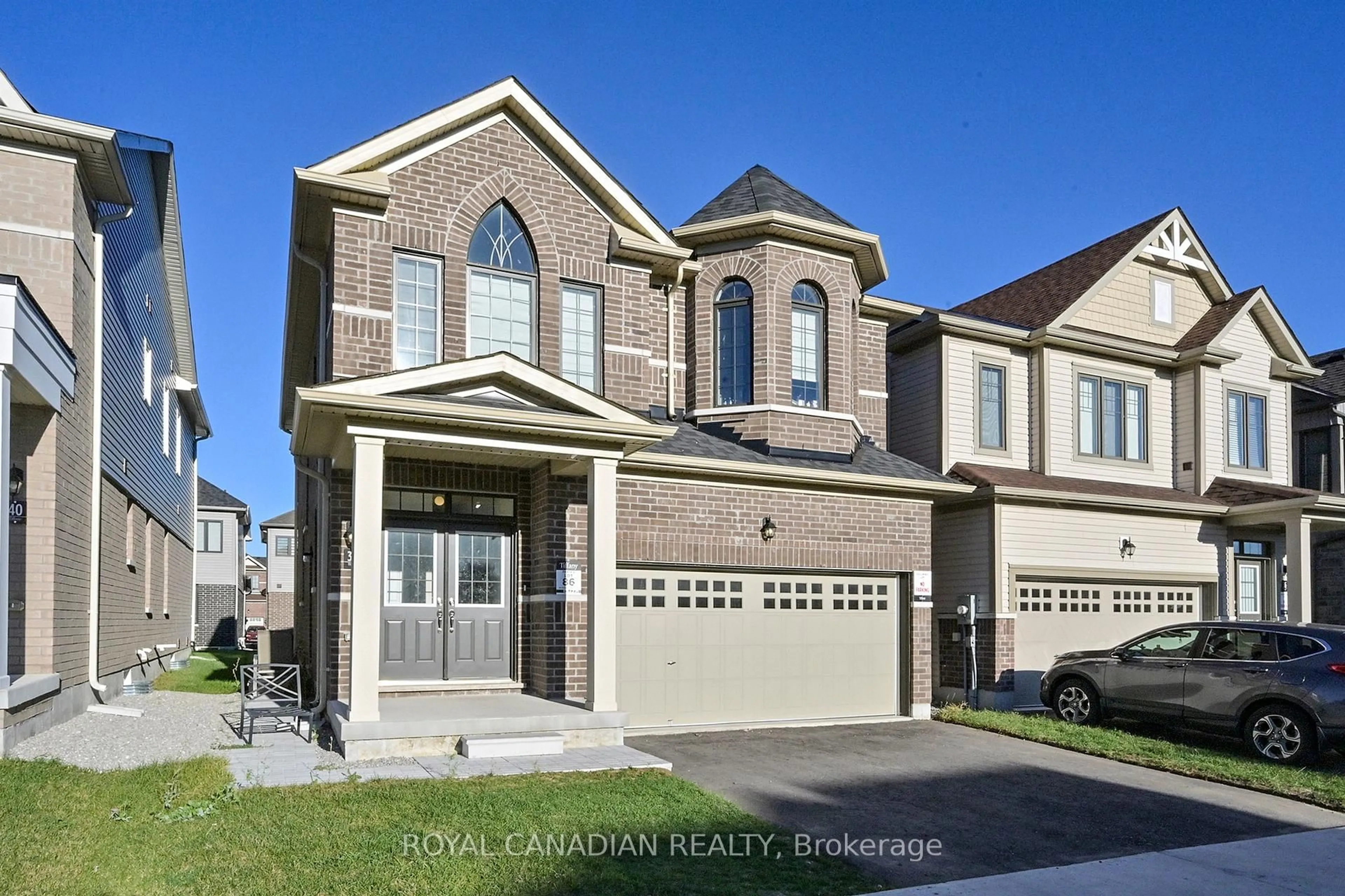 Home with brick exterior material, street for 38 Rochester Dr, Barrie Ontario L9J 0W1