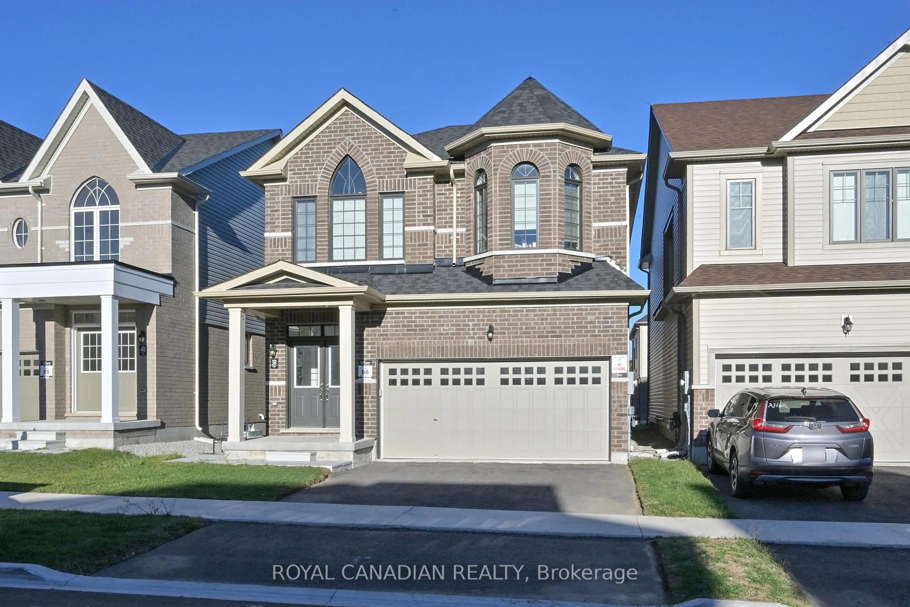 Home with brick exterior material, street for 38 Rochester Dr, Barrie Ontario L9J 0W1