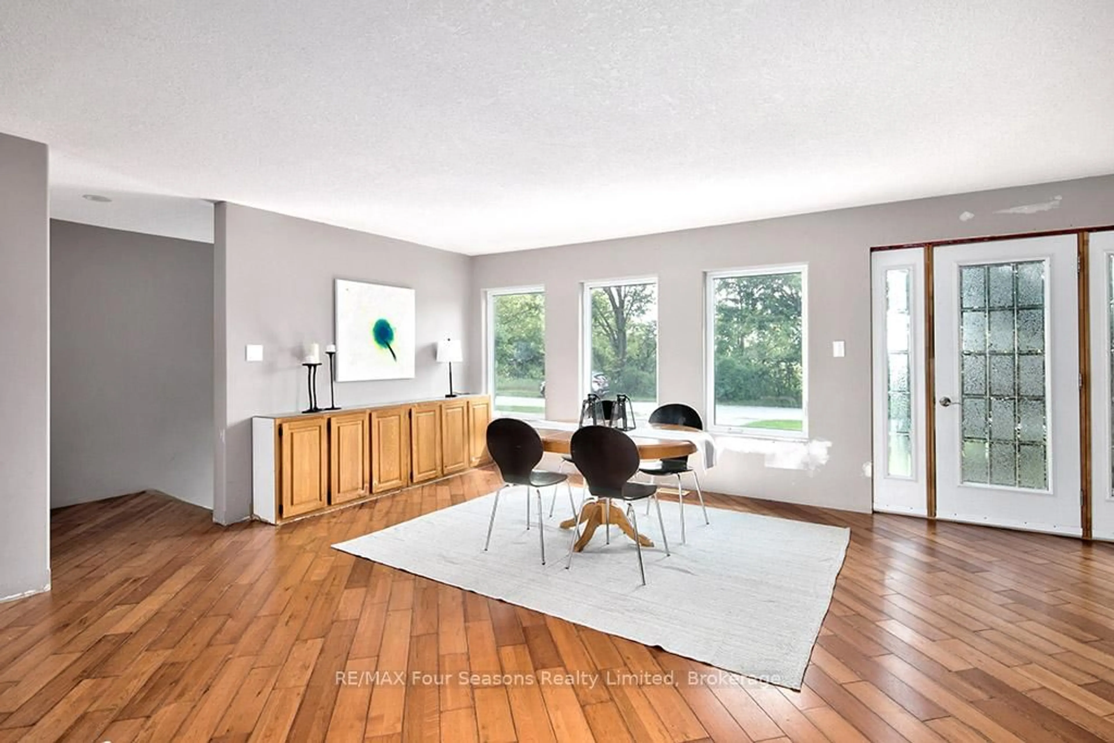 Living room with furniture, wood/laminate floor for 98 George St, Clearview Ontario L0M 1G0