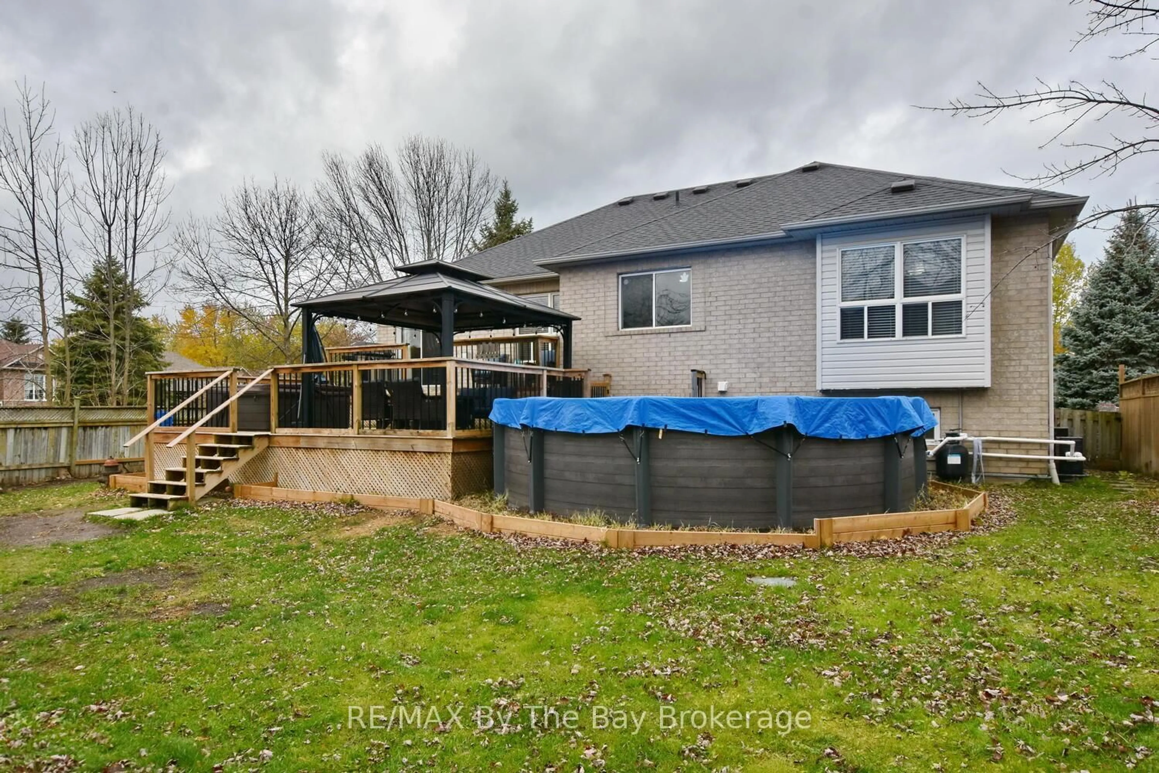 A pic from outside/outdoor area/front of a property/back of a property/a pic from drone, water/lake/river/ocean view for 69 Caribou Tr, Wasaga Beach Ontario L9Z 1N3