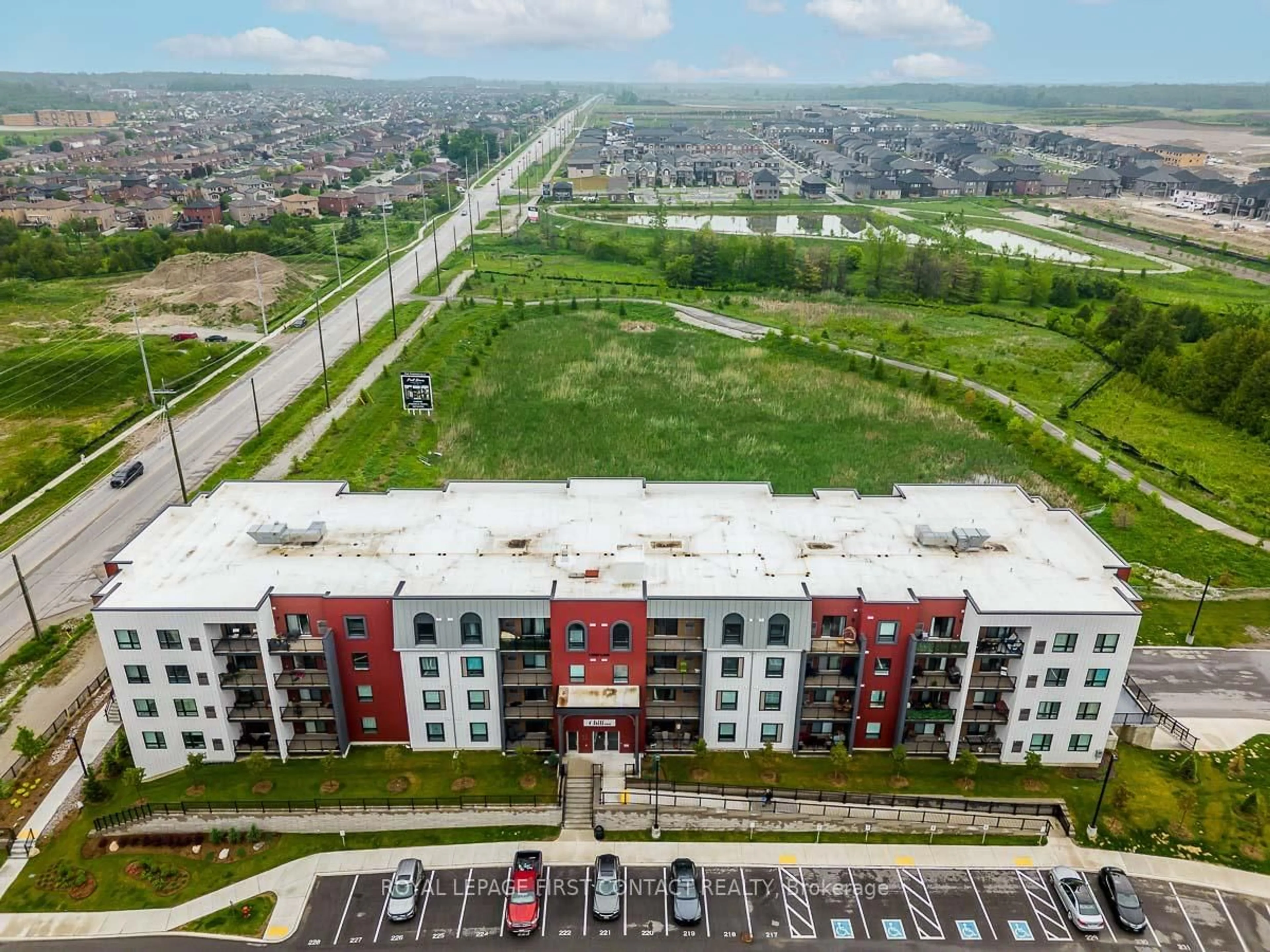 A pic from outside/outdoor area/front of a property/back of a property/a pic from drone, city buildings view from balcony for 1 CHEF Lane #209, Barrie Ontario L9J 0T1