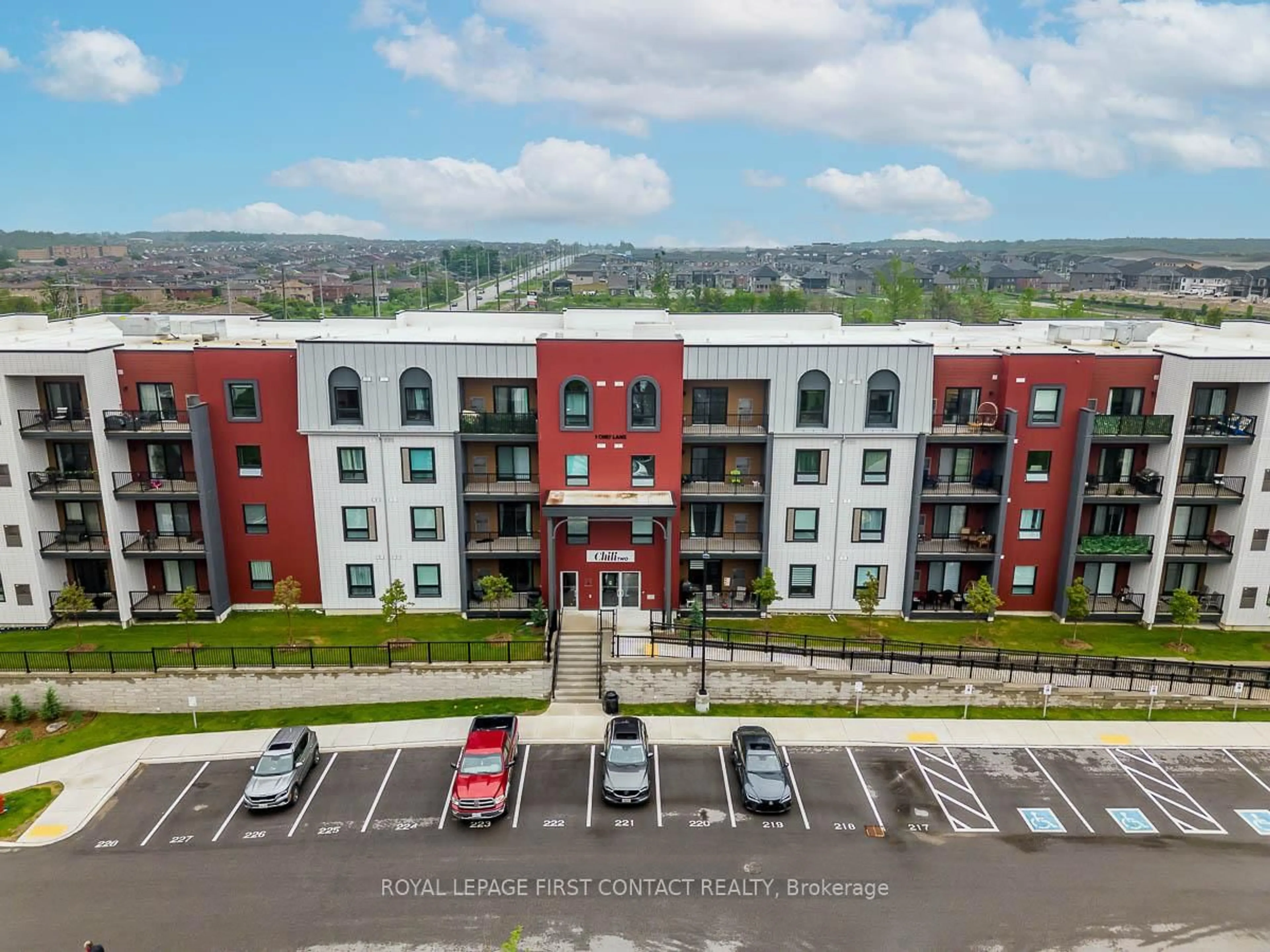 A pic from outside/outdoor area/front of a property/back of a property/a pic from drone, unknown for 1 CHEF Lane #209, Barrie Ontario L9J 0T1