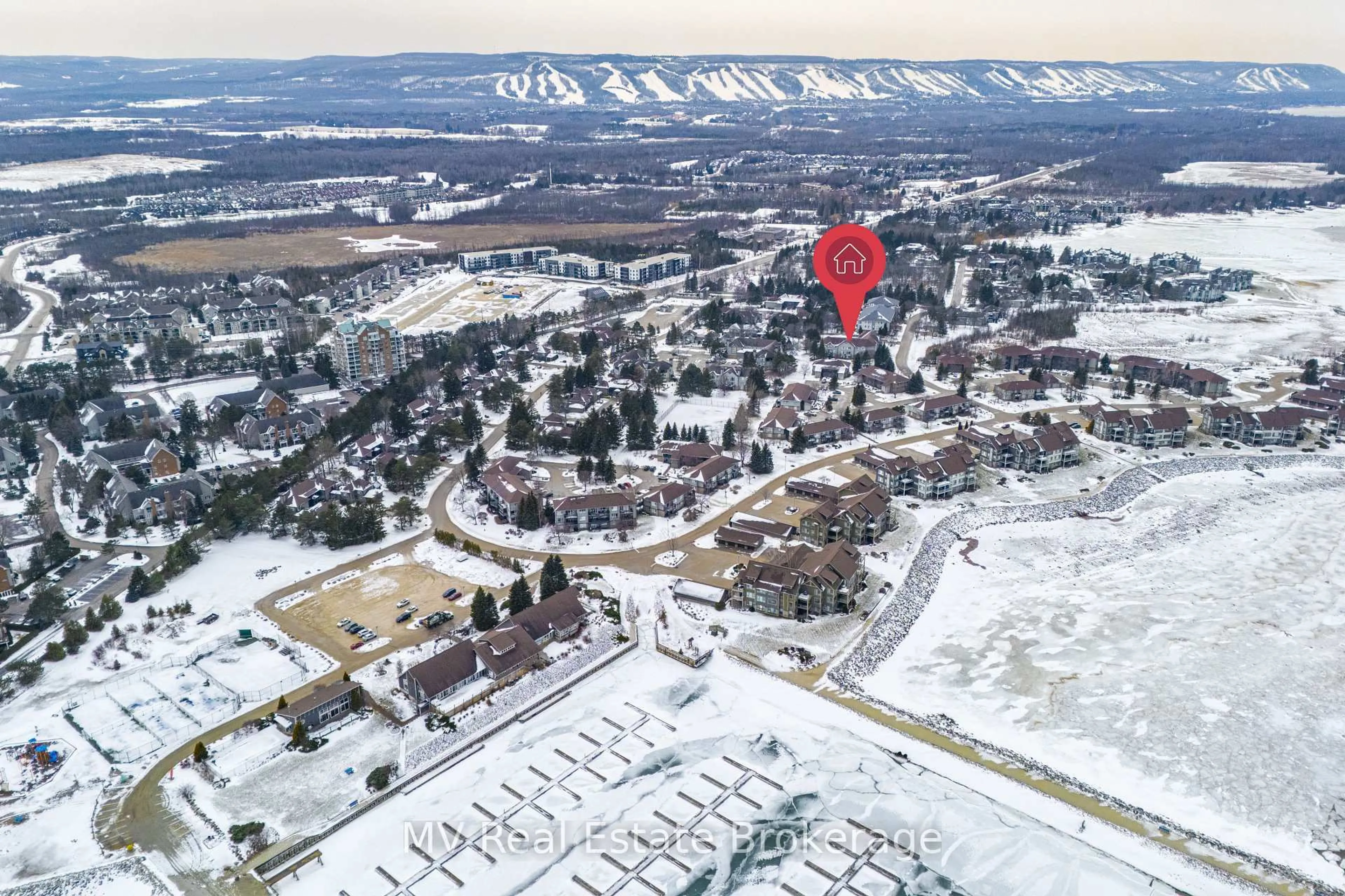 A pic from outside/outdoor area/front of a property/back of a property/a pic from drone, mountain view for 711 Johnston Park Ave #12, Collingwood Ontario L9Y 5C7