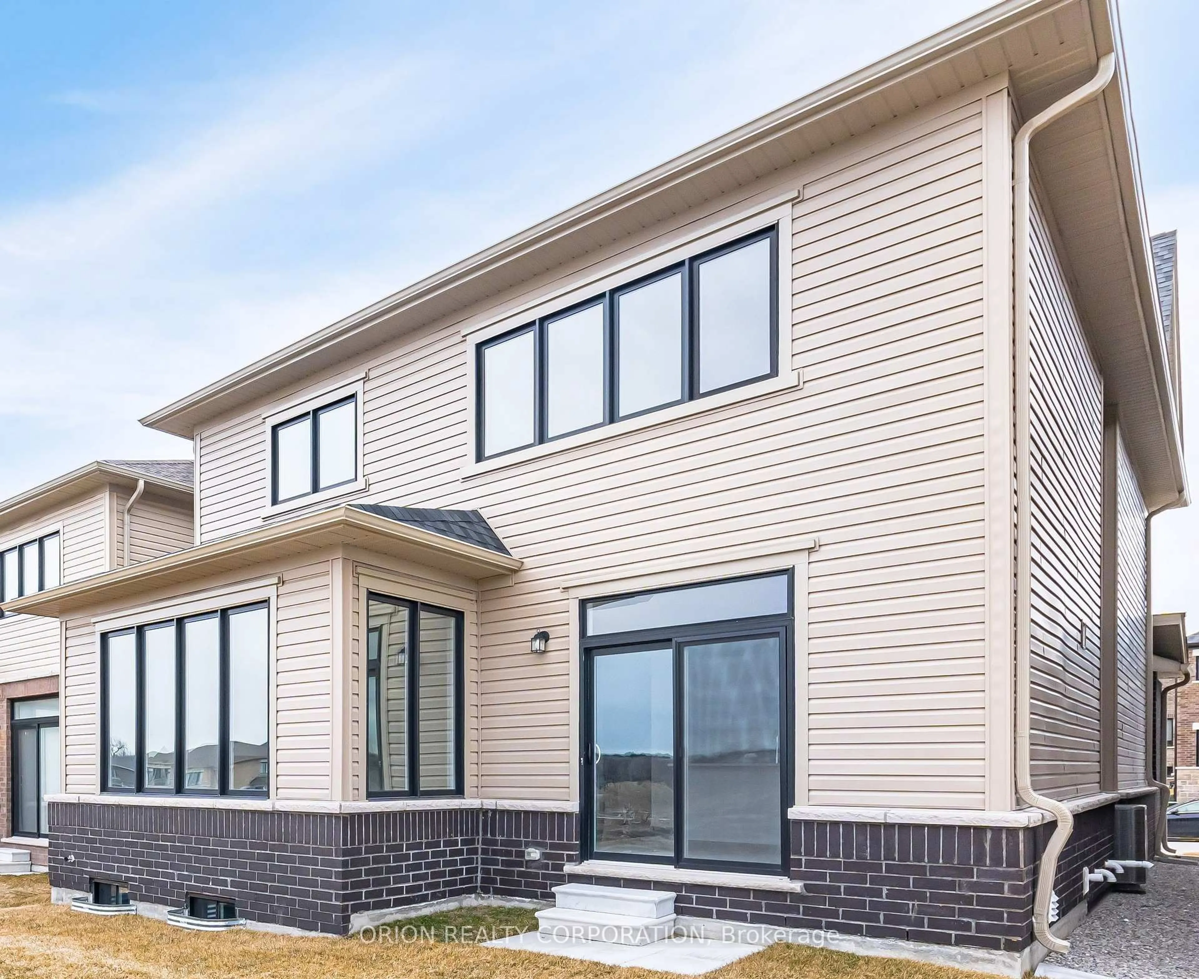 Home with brick exterior material, building for 18 Kingsbury Tr, Barrie Ontario L9K 0W9