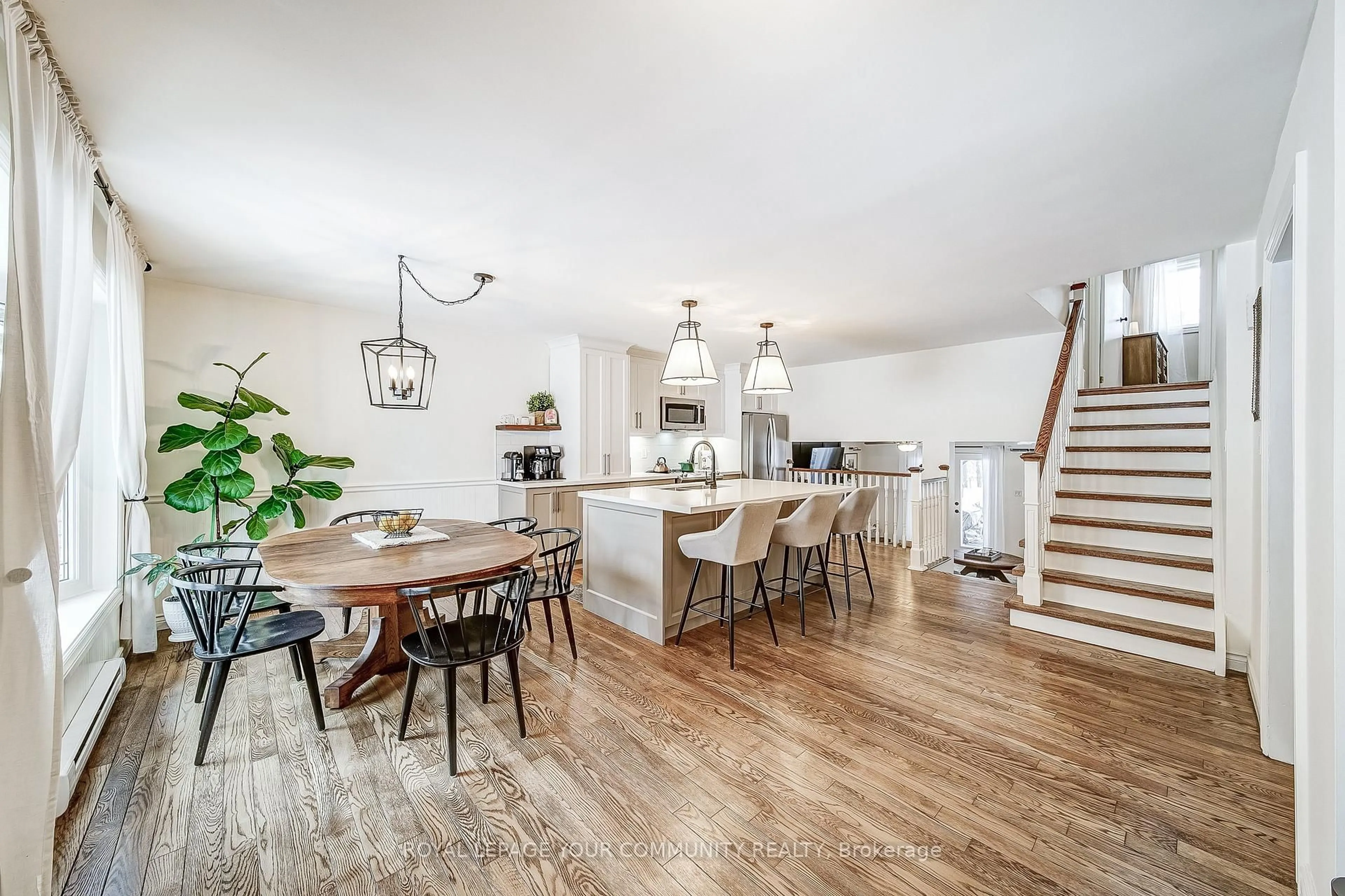 Open concept kitchen, wood/laminate floor for 798 Lockhart Rd, Barrie Ontario L9J 0B6
