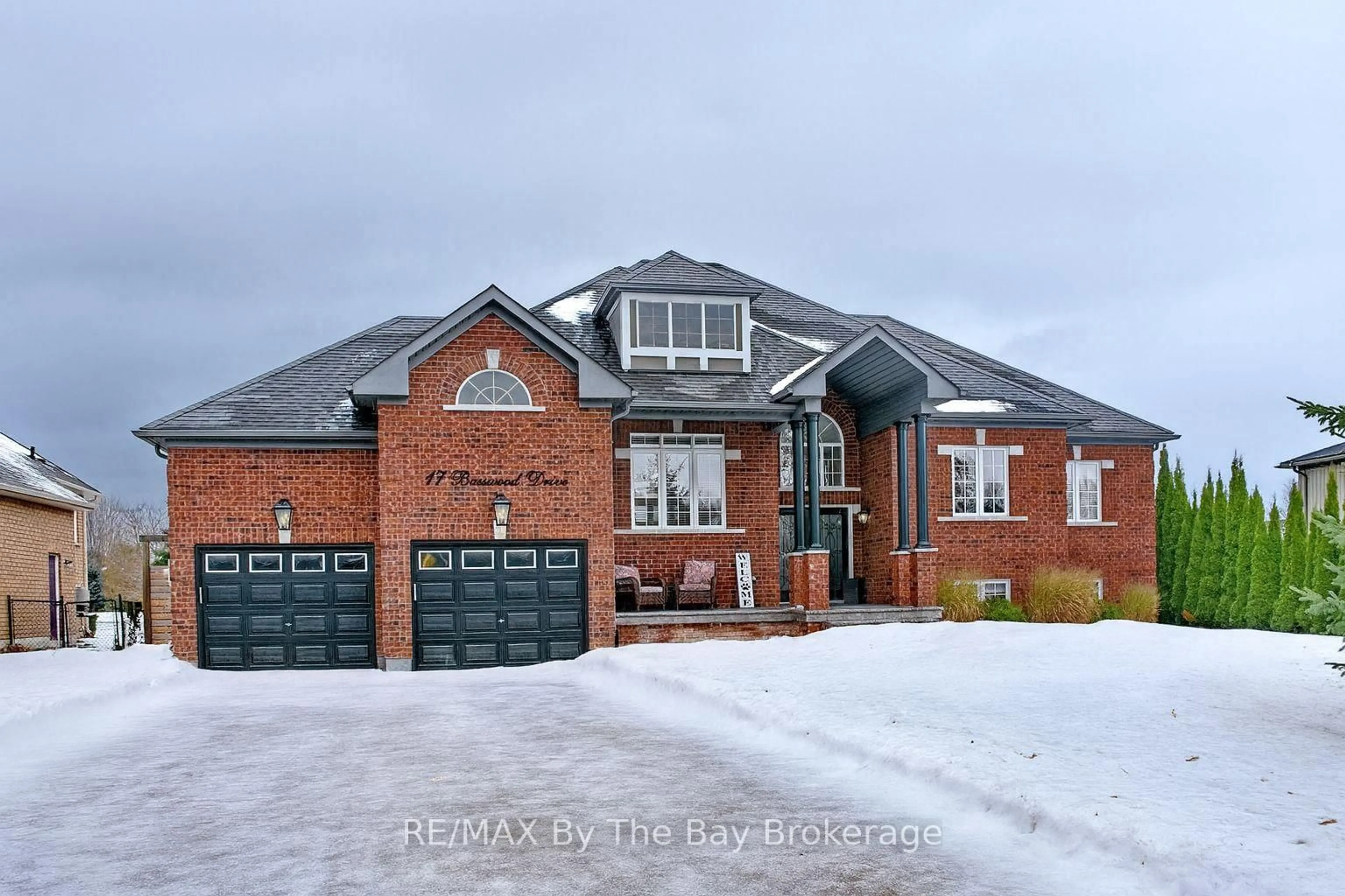 Home with brick exterior material, street for 17 Basswood Dr, Wasaga Beach Ontario L9Z 0A8