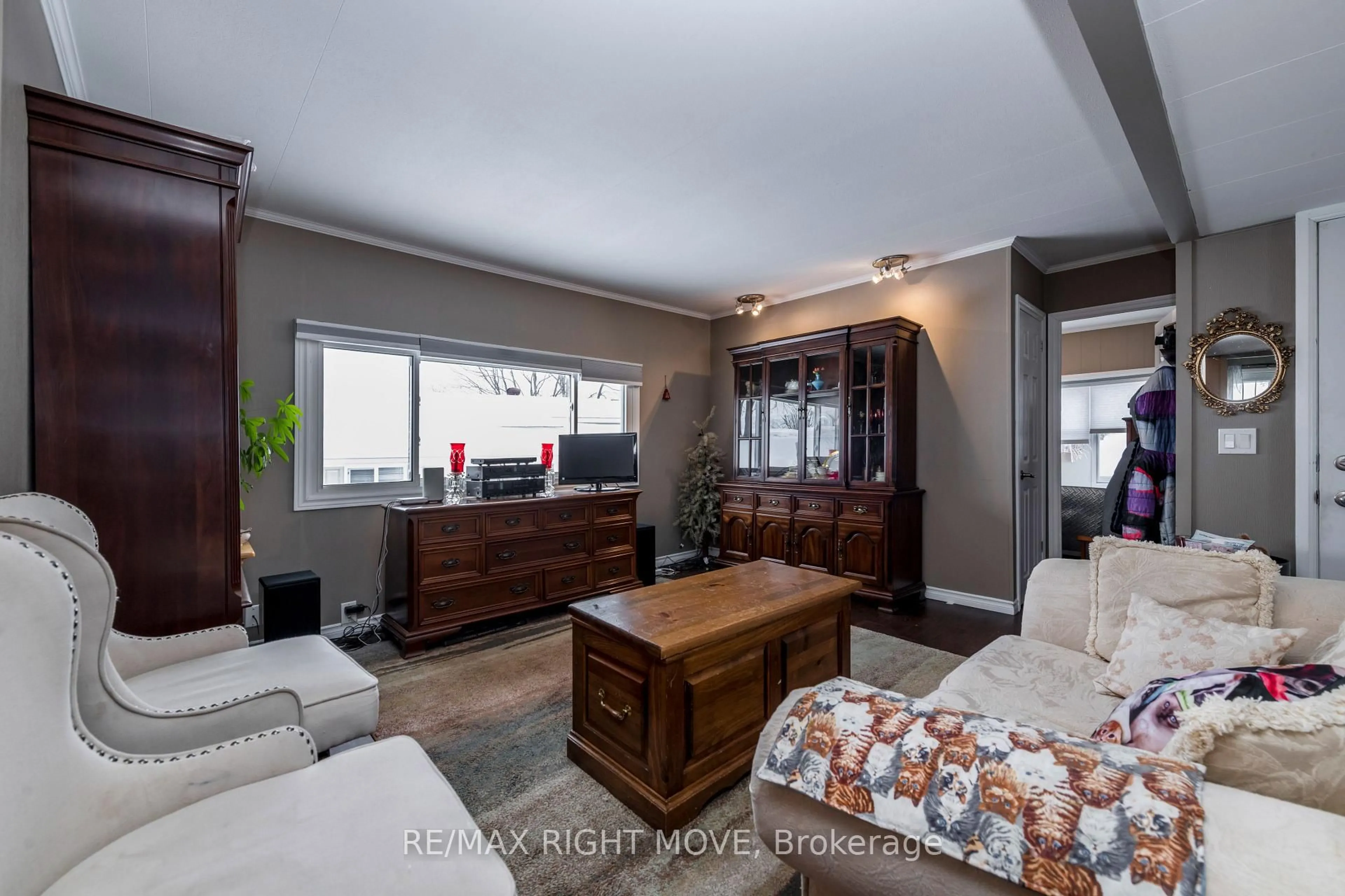 Living room with furniture, unknown for 32 Cameron Dr, Oro-Medonte Ontario L0L 1T0