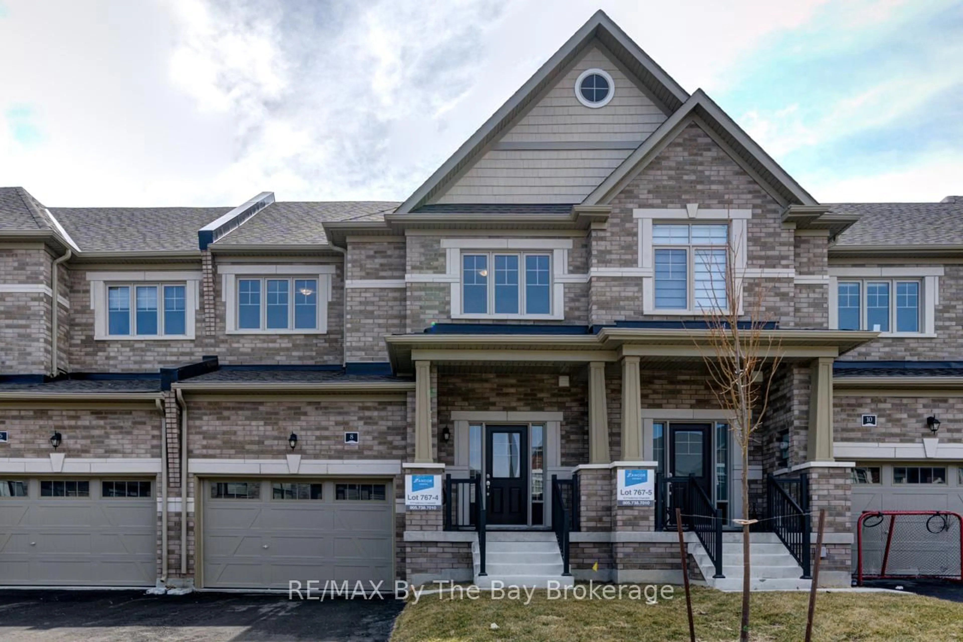 Home with brick exterior material, street for 8 Federica Cres, Wasaga Beach Ontario L9Z 0N6