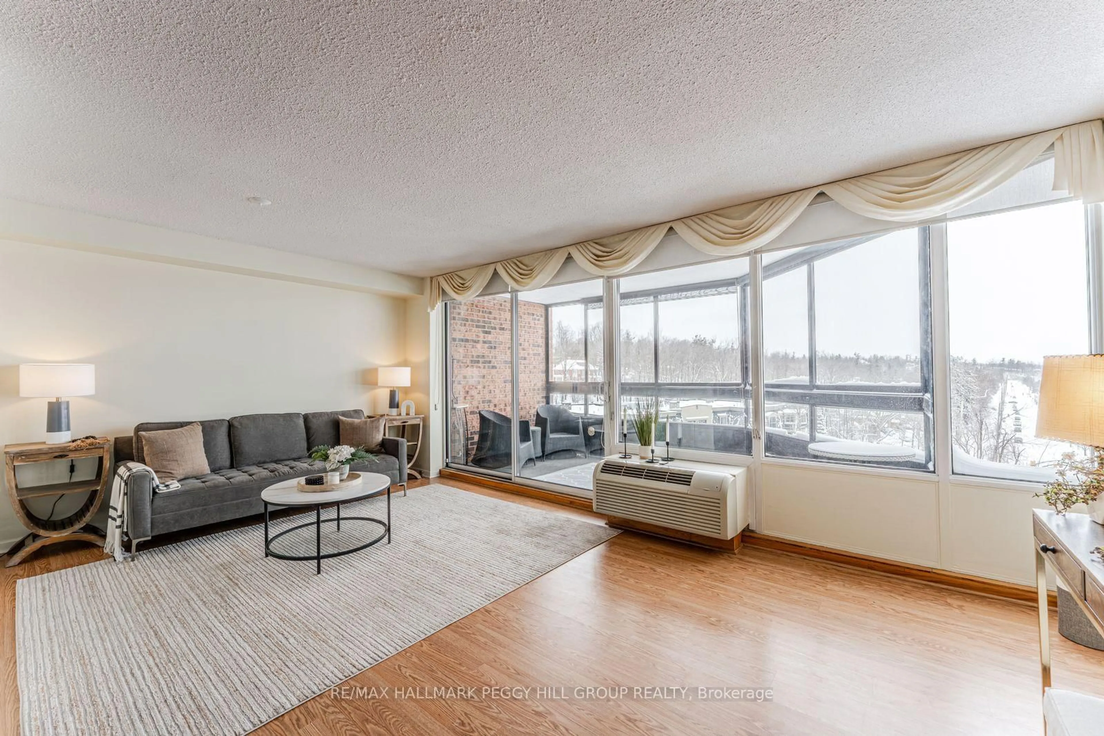 Living room with furniture, unknown for 181 Collier St #803, Barrie Ontario L4M 5L6