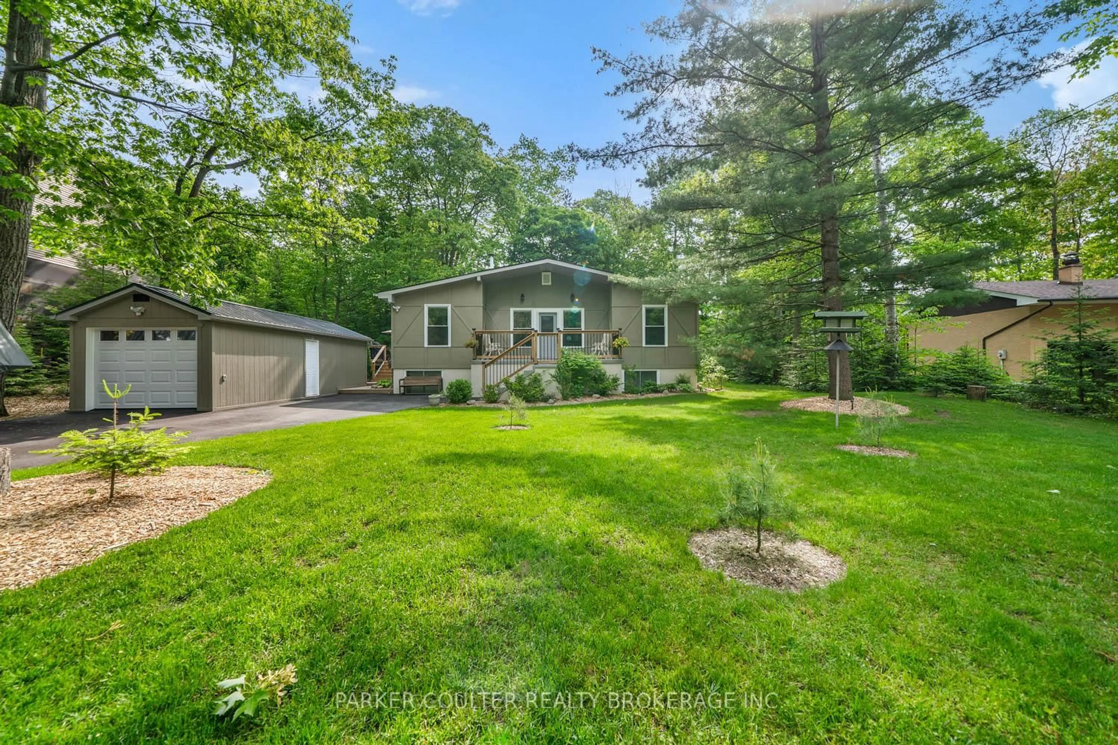 A pic from outside/outdoor area/front of a property/back of a property/a pic from drone, unknown for 11 Duquette Crt, Tiny Ontario L9M 0H3