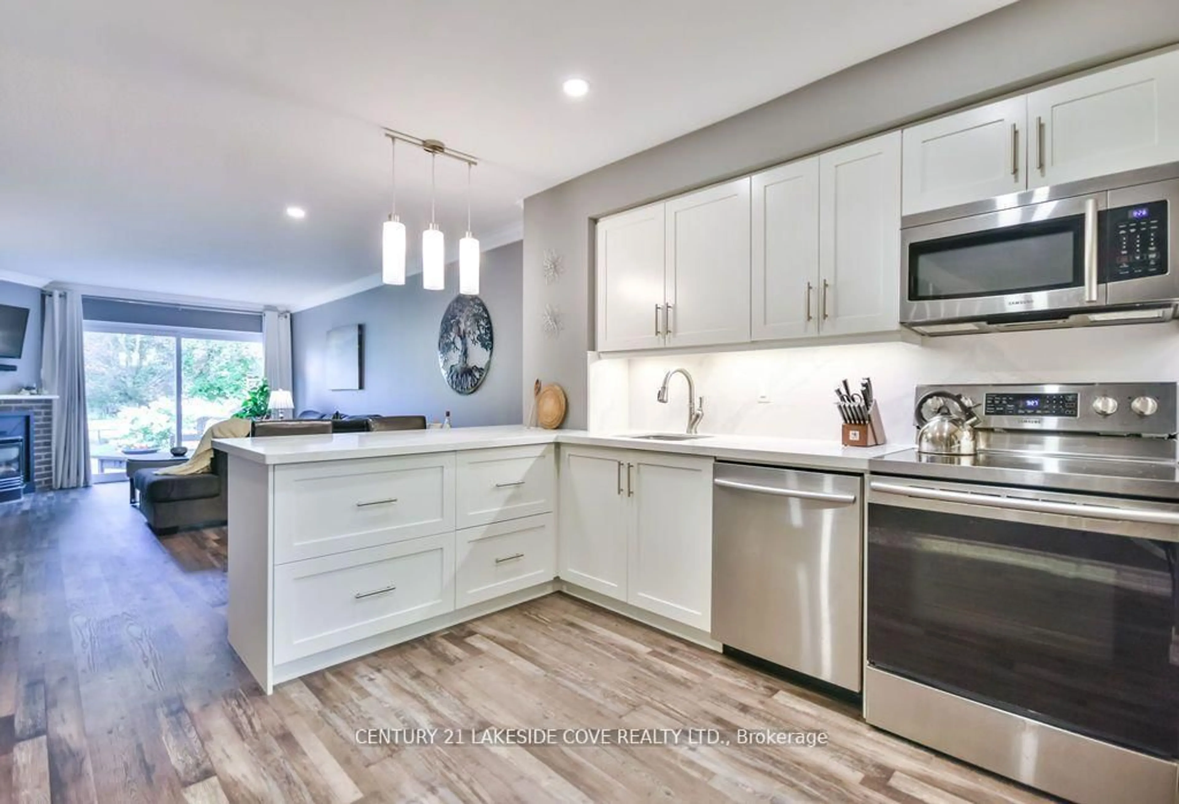 Open concept kitchen, ceramic/tile floor for 70 Laguna Pkwy #Unit #7, Ramara Ontario L0K 1B0