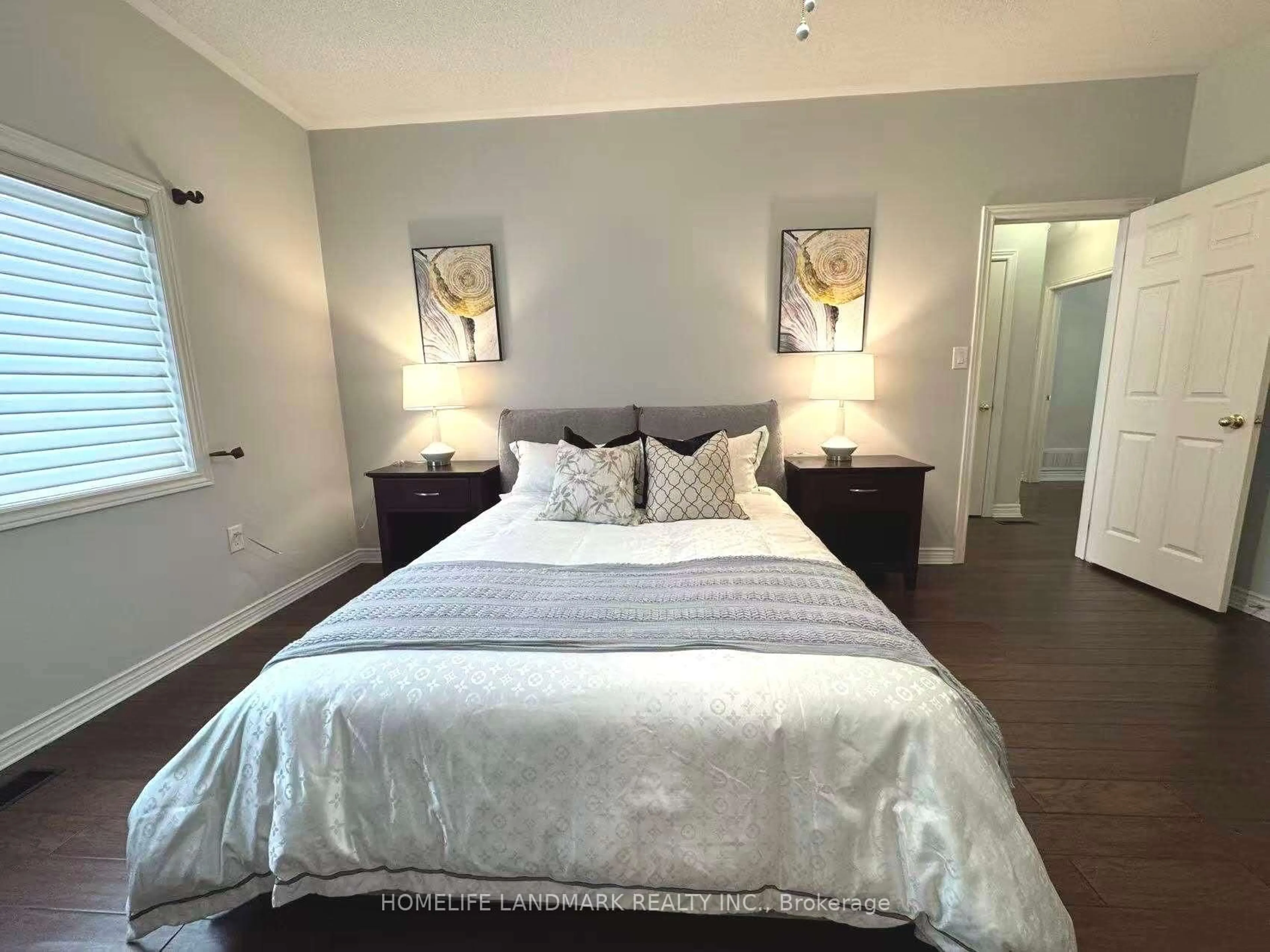 Bedroom with bed, wood/laminate floor for 265 Dock Rd, Barrie Ontario L4N 0L3