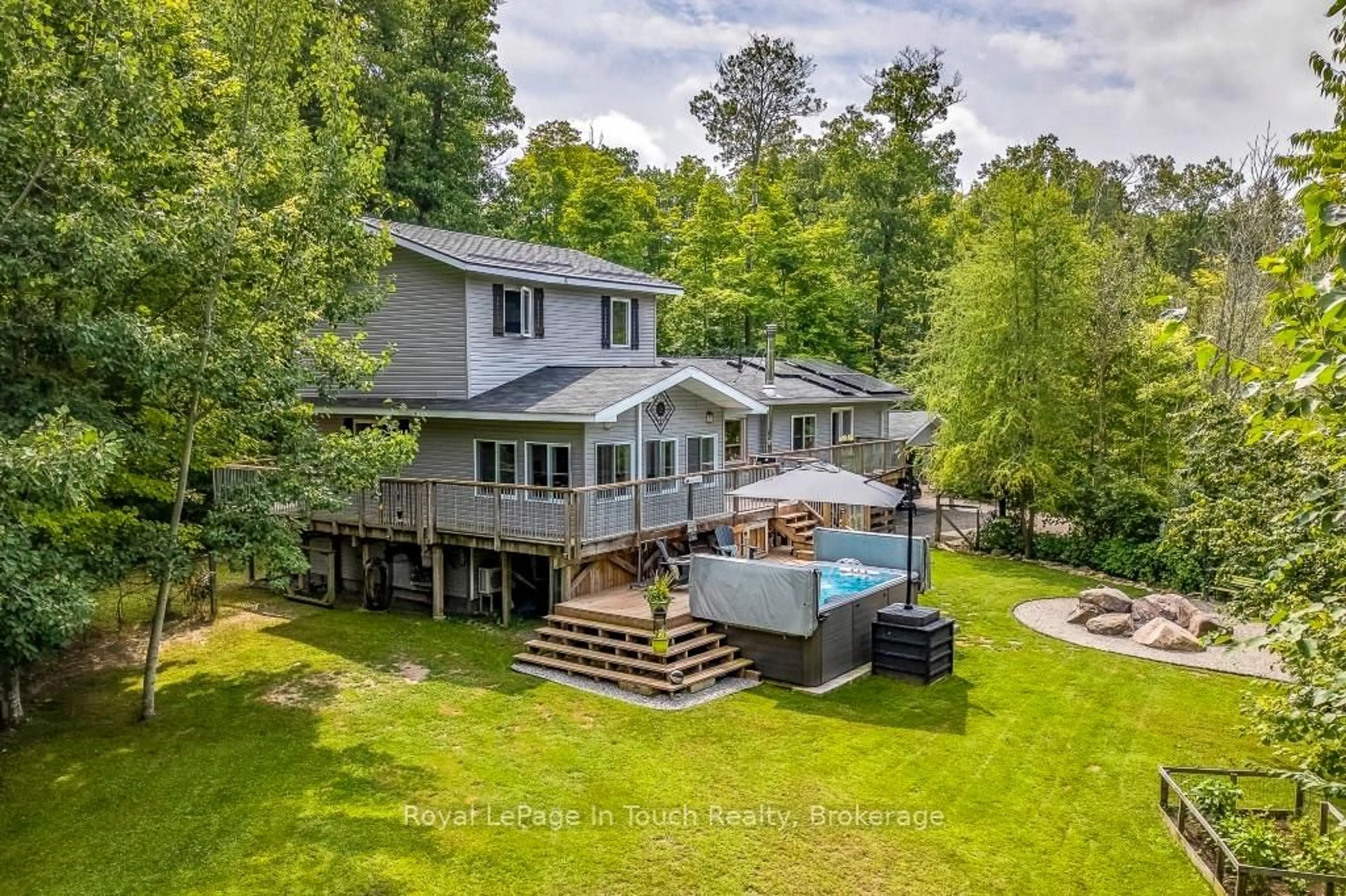 A pic from outside/outdoor area/front of a property/back of a property/a pic from drone, water/lake/river/ocean view for 36 Meadows Ave, Tay Ontario L0K 2C0