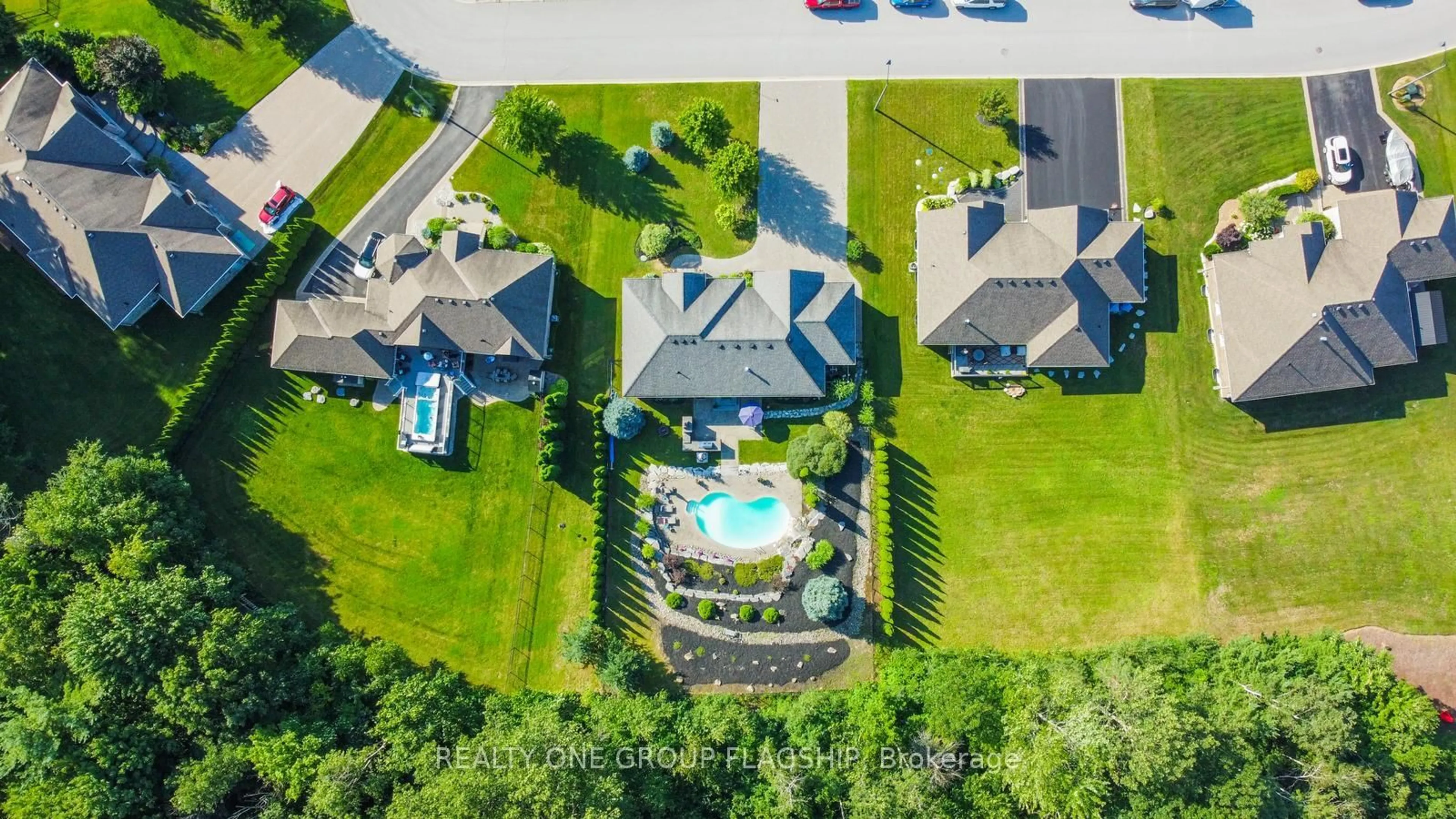 A pic from outside/outdoor area/front of a property/back of a property/a pic from drone, water/lake/river/ocean view for 24 Wendat Tr, Springwater Ontario L4M 6T4