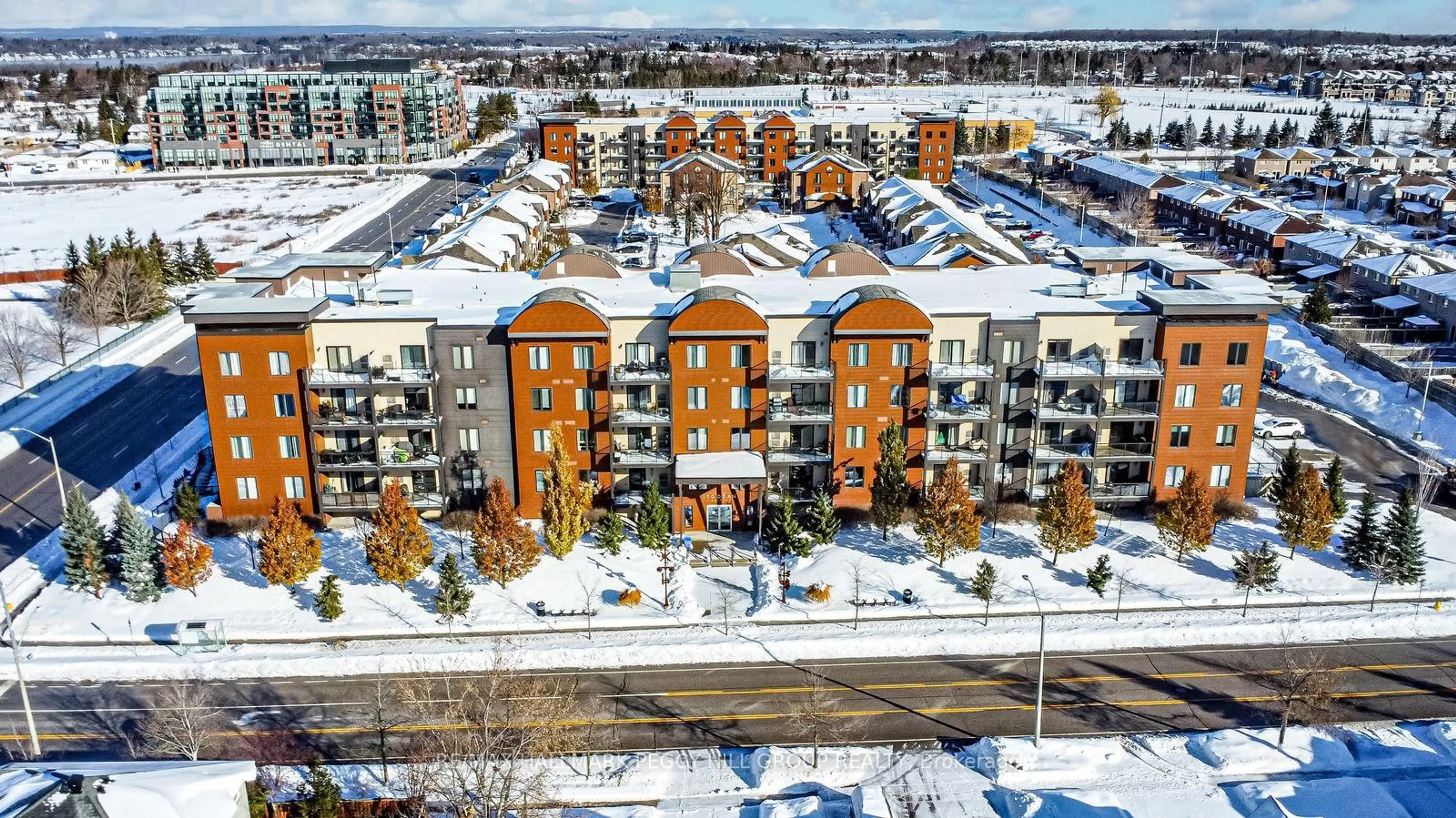 A pic from outside/outdoor area/front of a property/back of a property/a pic from drone, city buildings view from balcony for 100 Dean Ave #110, Barrie Ontario L9J 0H1