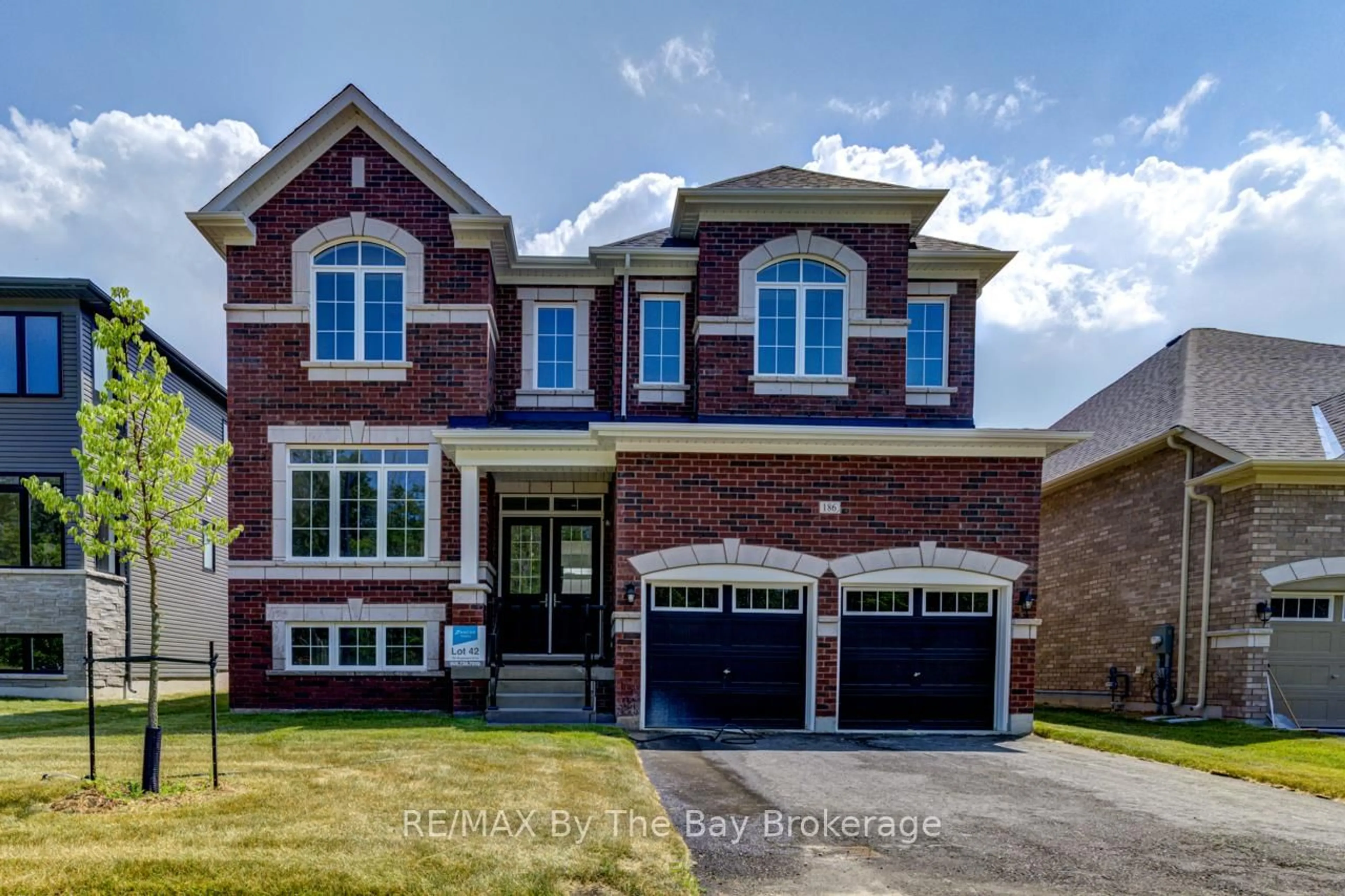 Home with brick exterior material, street for 186 Mapleside Dr, Wasaga Beach Ontario L9Z 0L4