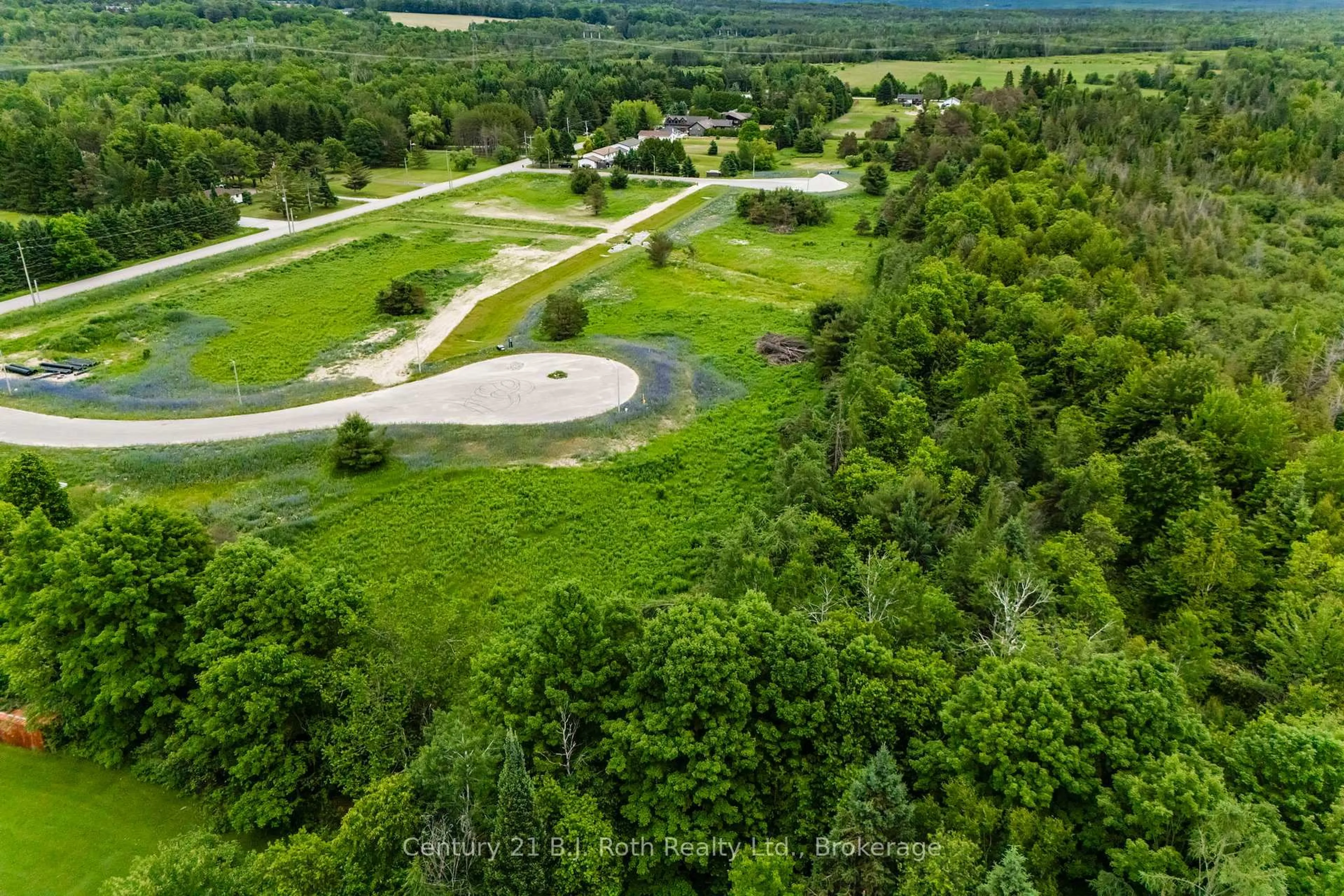 A pic from outside/outdoor area/front of a property/back of a property/a pic from drone, forest/trees view for 14 Greenlaw Crt, Springwater Ontario L0L 1V0