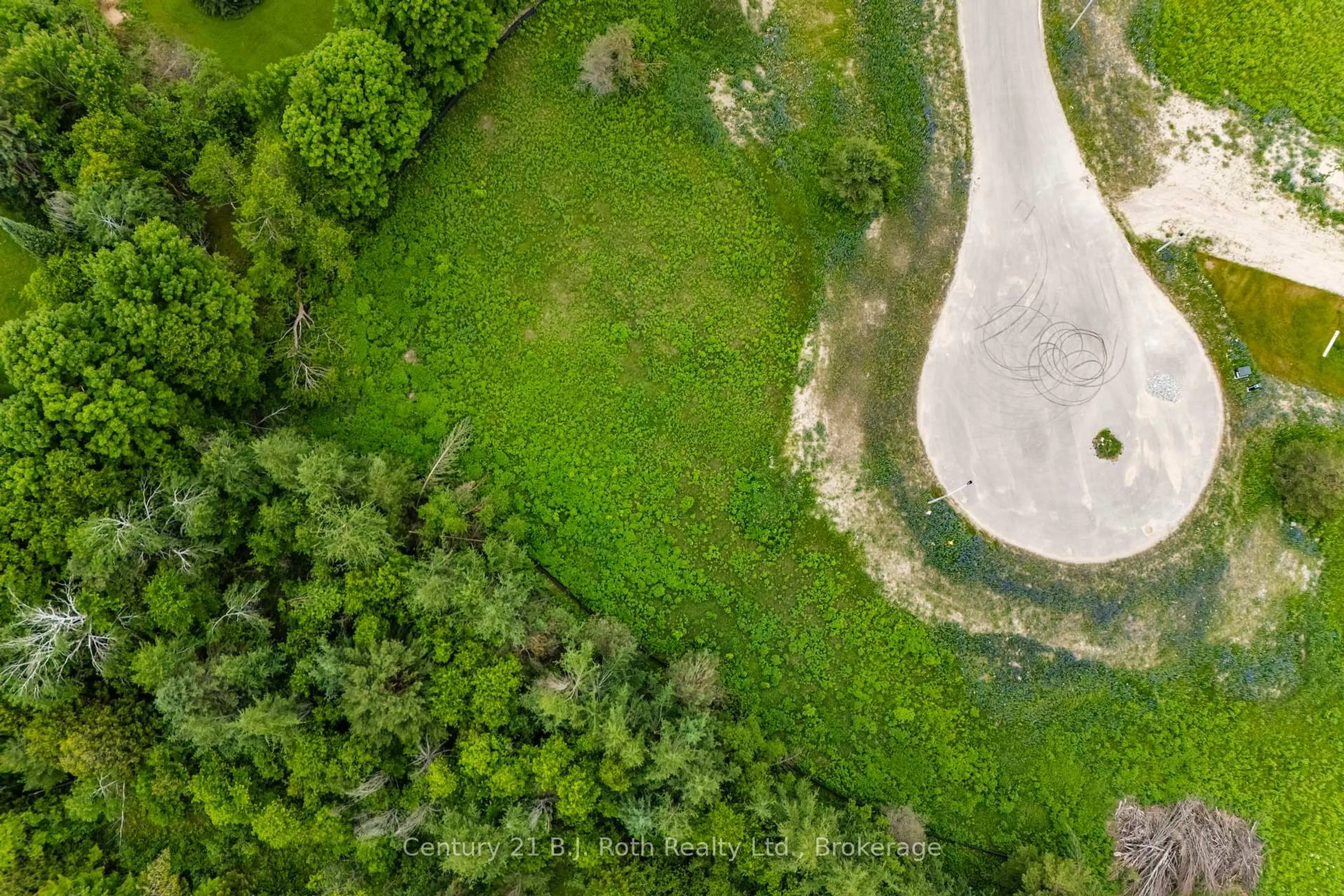 A pic from outside/outdoor area/front of a property/back of a property/a pic from drone, forest/trees view for 14 Greenlaw Crt, Springwater Ontario L0L 1V0