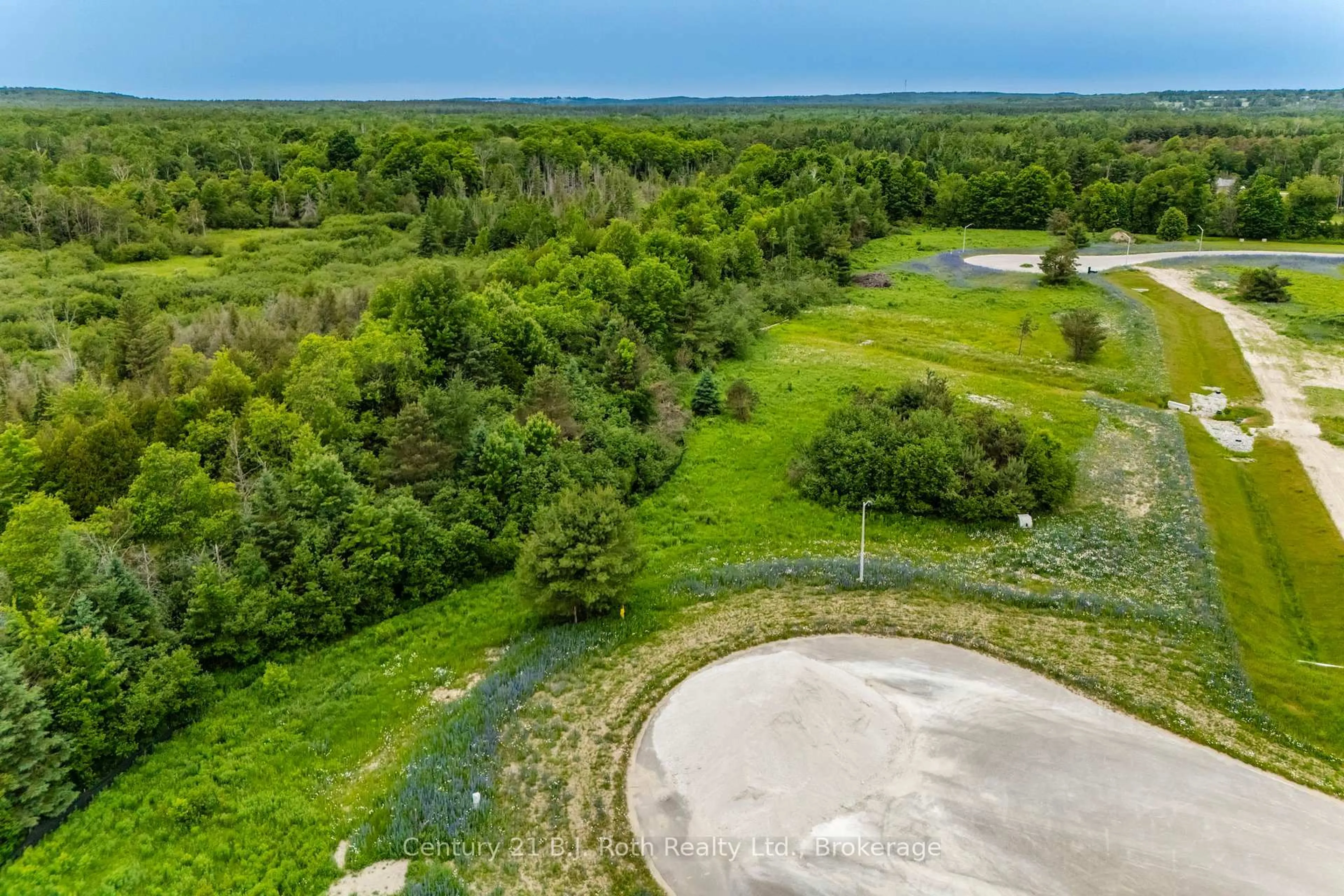 A pic from outside/outdoor area/front of a property/back of a property/a pic from drone, water/lake/river/ocean view for 4 RUMBLE Crt, Springwater Ontario L0L 1V0