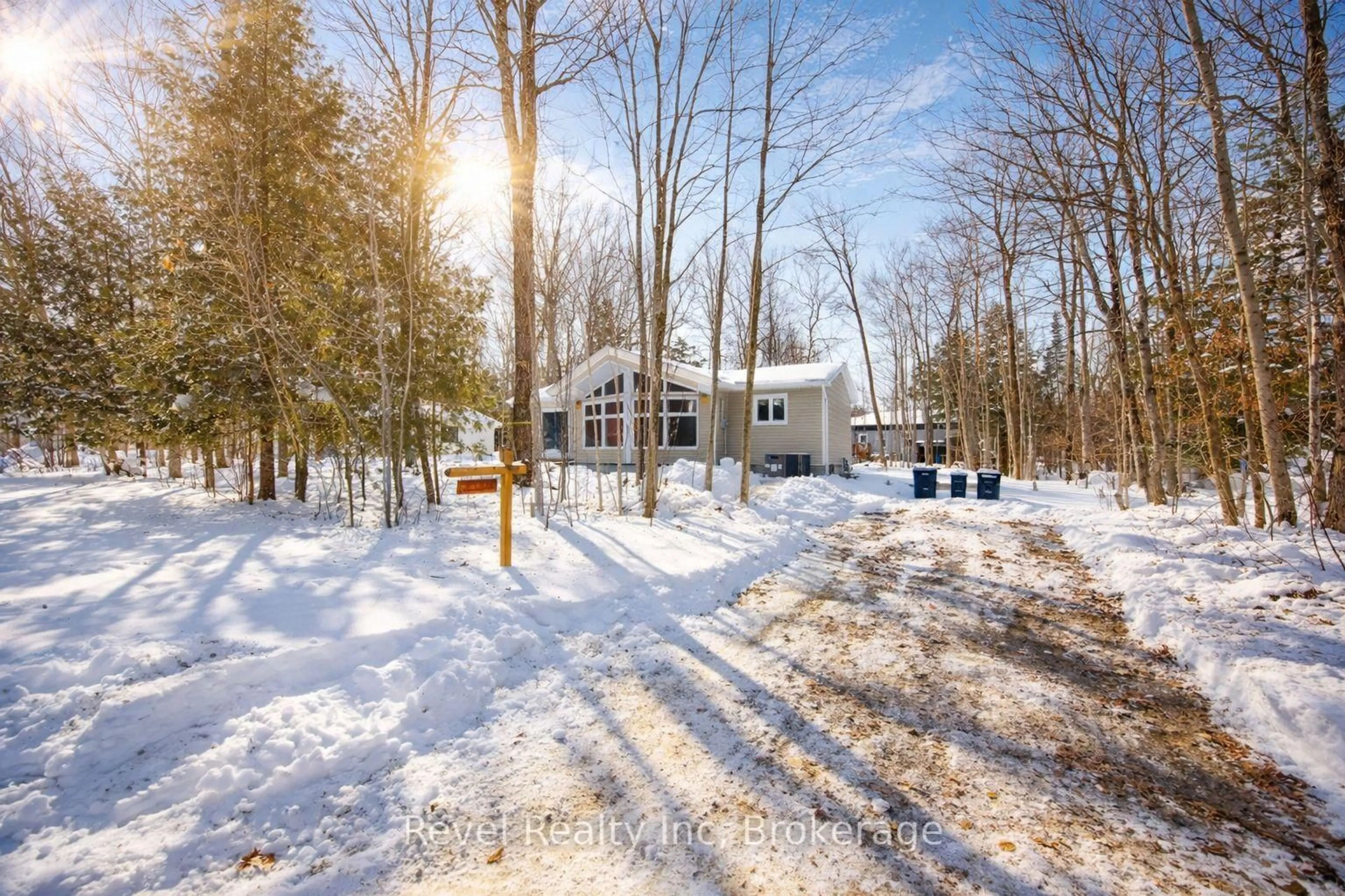 A pic from outside/outdoor area/front of a property/back of a property/a pic from drone, forest/trees view for 8 Manitou Cres, Tiny Ontario L9M 0C6